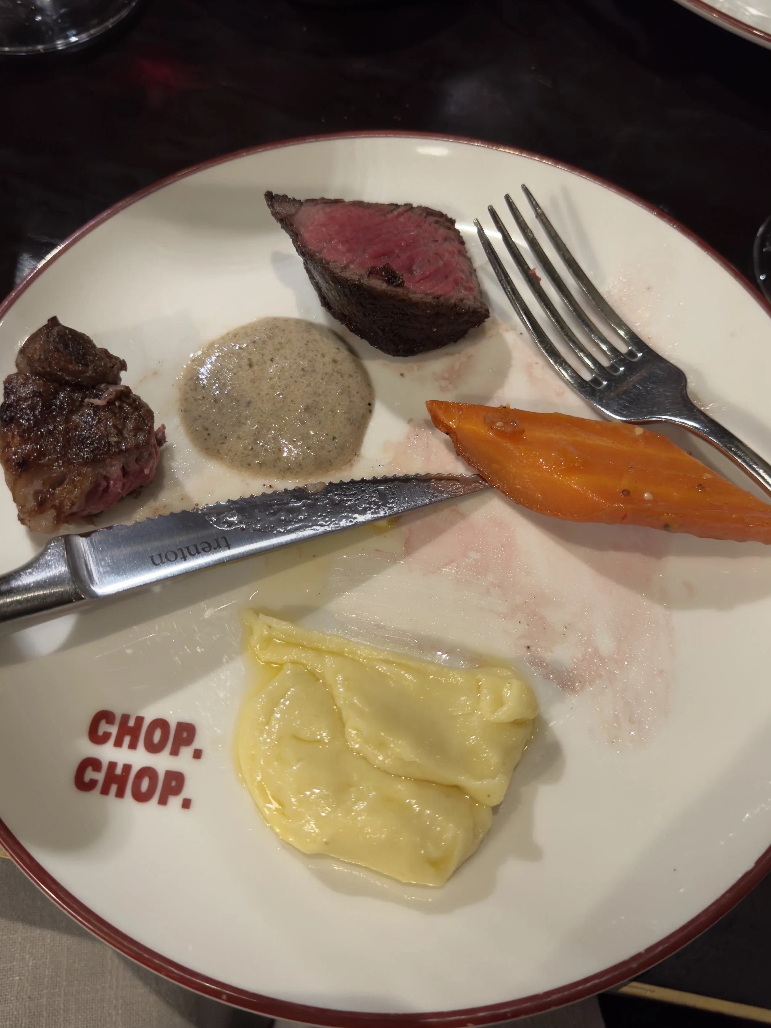 A tasting plate of steak, mash and carrots