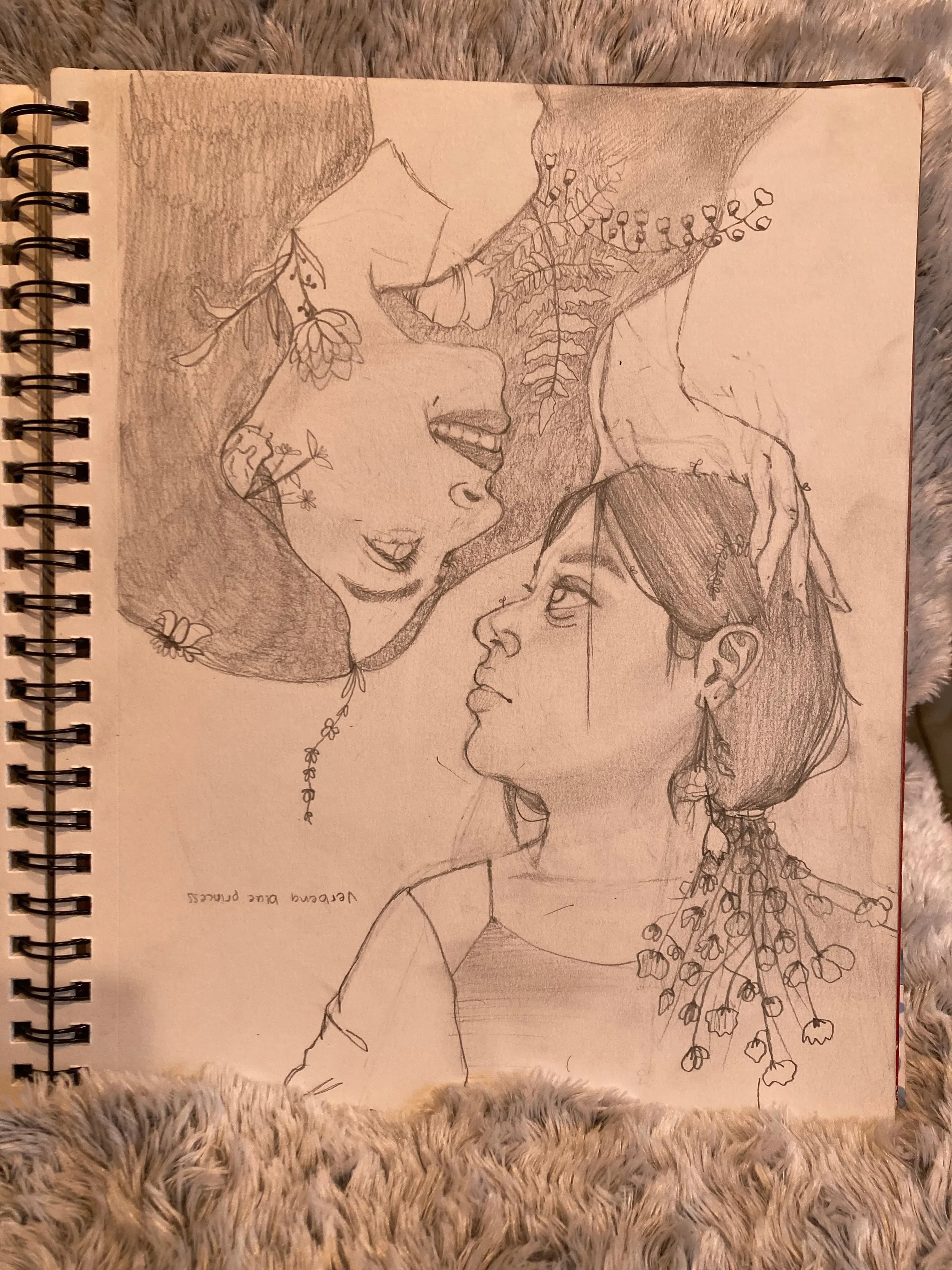 A detailed pencil sketch of a couple in a loving embrace, with floral accents.