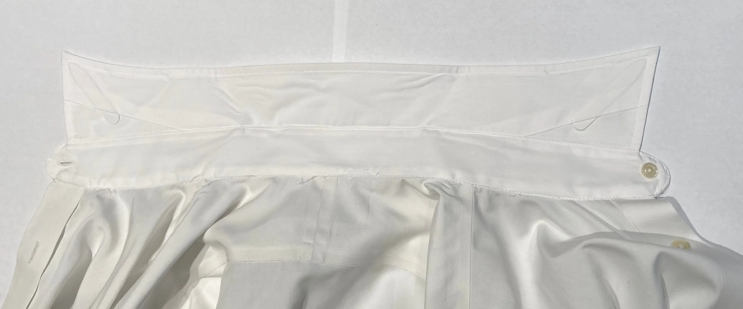 Under collar and stand of shirt
