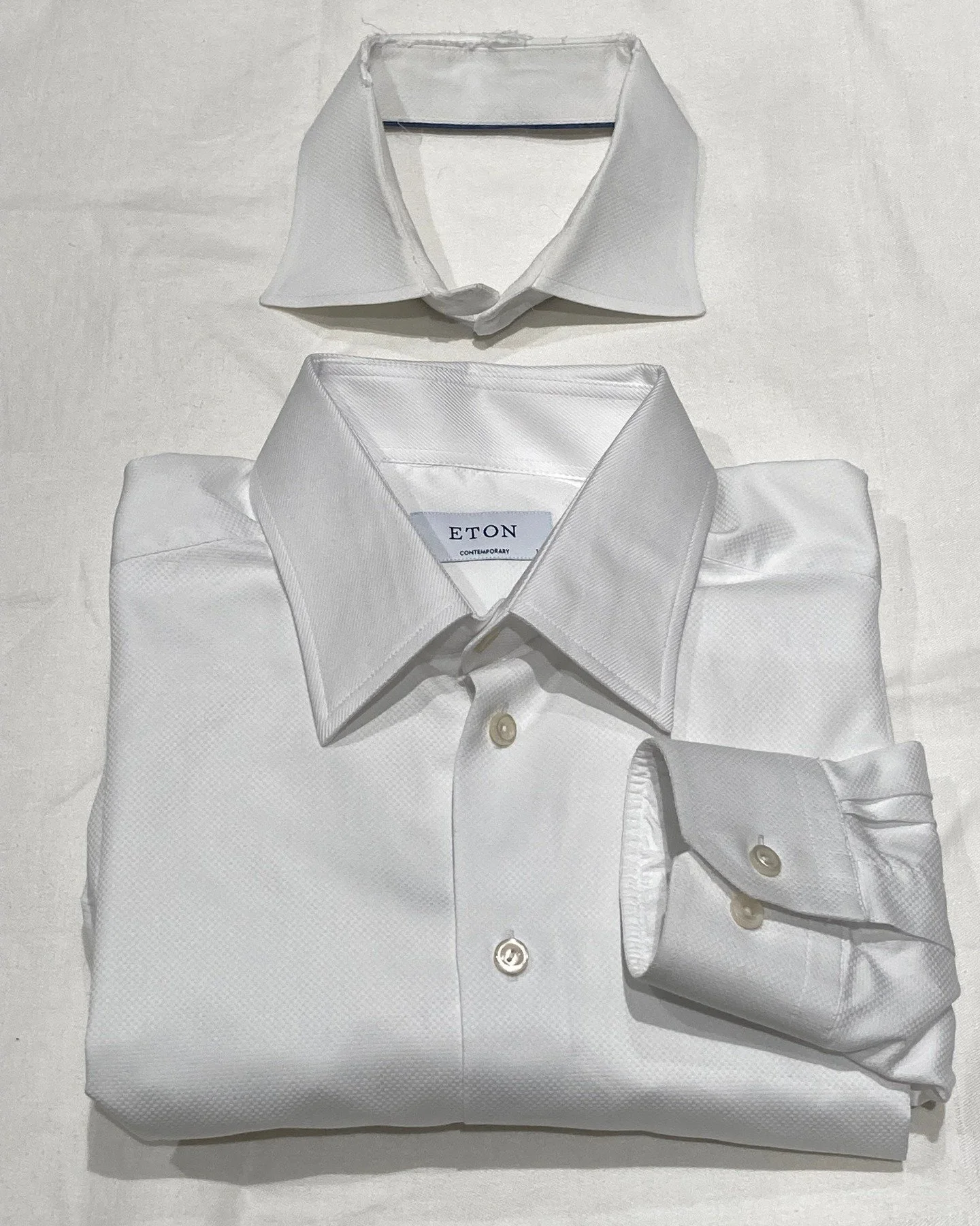 When a shirt collar wears out it can be changed to make the shirt good as new. Here three shirt collars we recently changed. A cut corner barrel cuff shirt where a twill collar. A French cuff twill shirt with a new twill collar made to match the shir