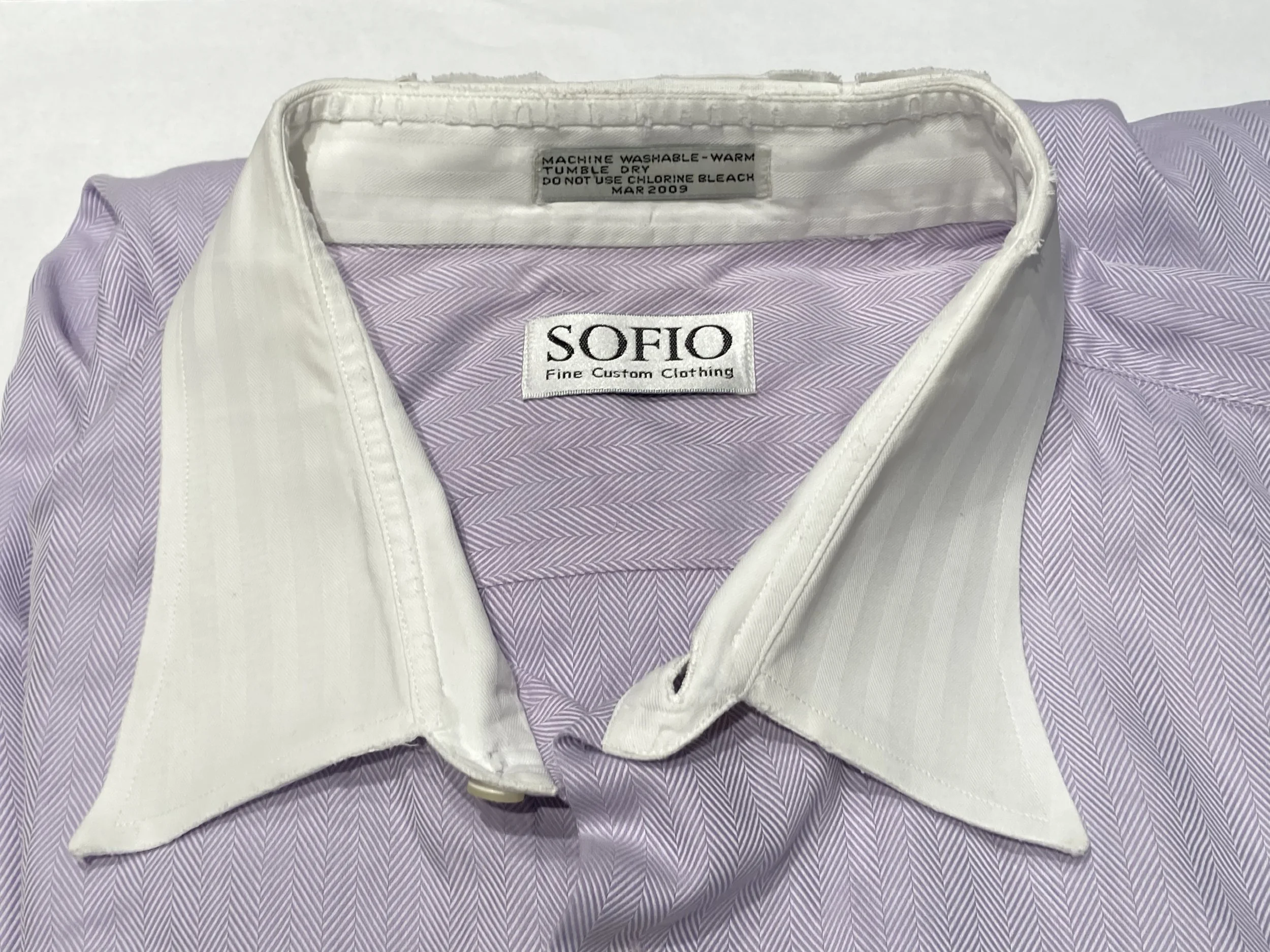 Frayed herringbone collar