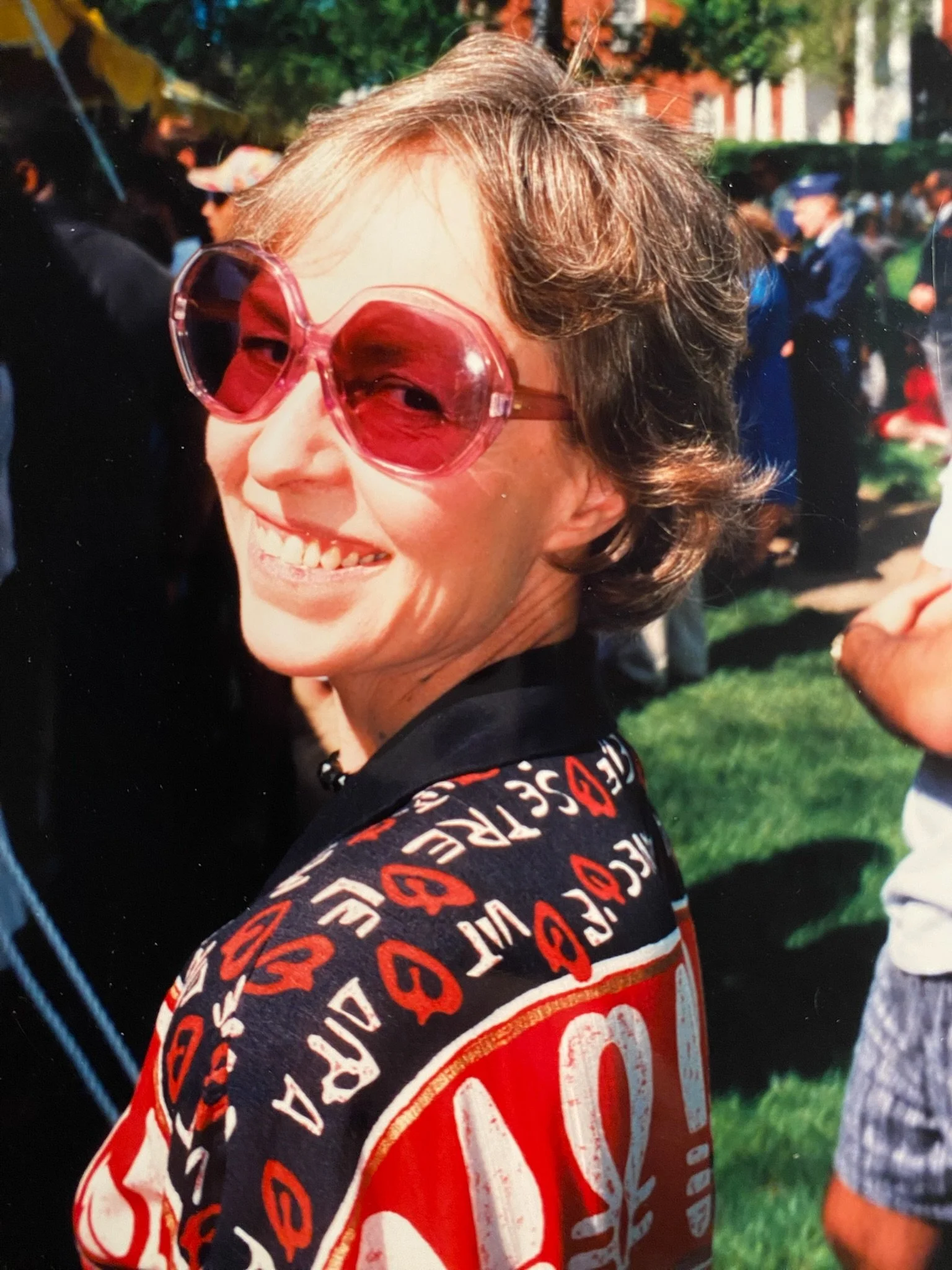 Melinda smiling with sunglasses