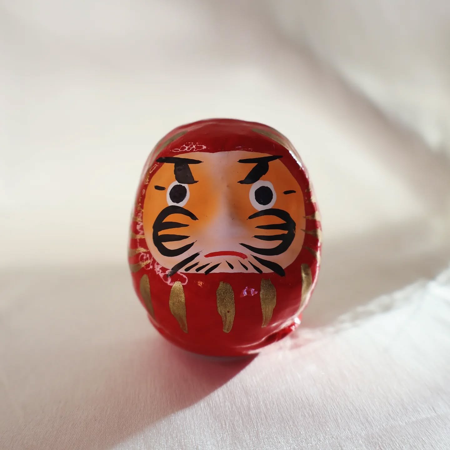 Daruma is a traditional Japanese doll, the most famous region is Gunma prefecture, however Saitama, Fukushima, Miyazaki and Tokyo also manufacture in their cities. It symbolises perseverance, resilience and good luck. Daruma is deeply connected with 