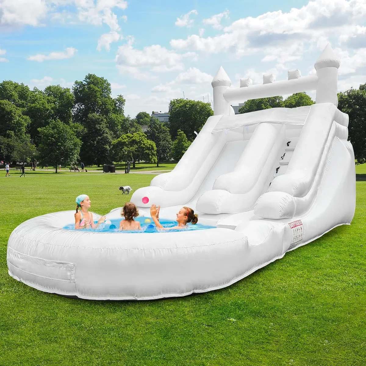 Modern white inflatable water slide rental in Washington, MI by Velvet Party RenModern white inflatable water slide rental in Washington, MI by Velvet Party Rentals. . Features a splash pool for kids' backyard birthday parties and summer events