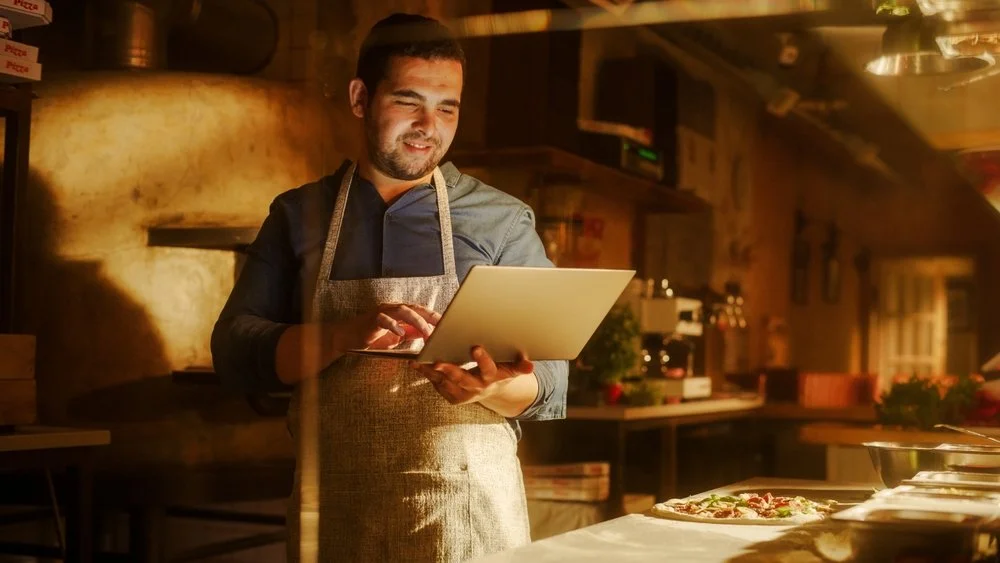 professional hospitality owner reviewing systems