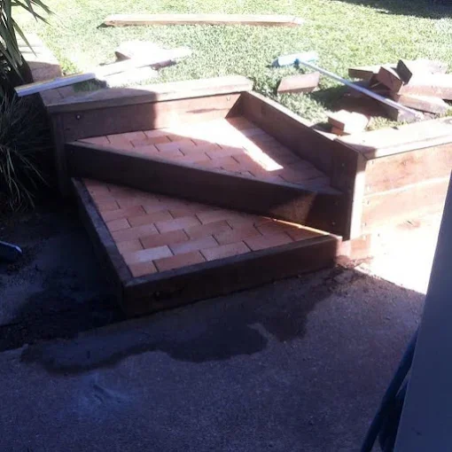 stairs built into a retaining wall in alexandra hills