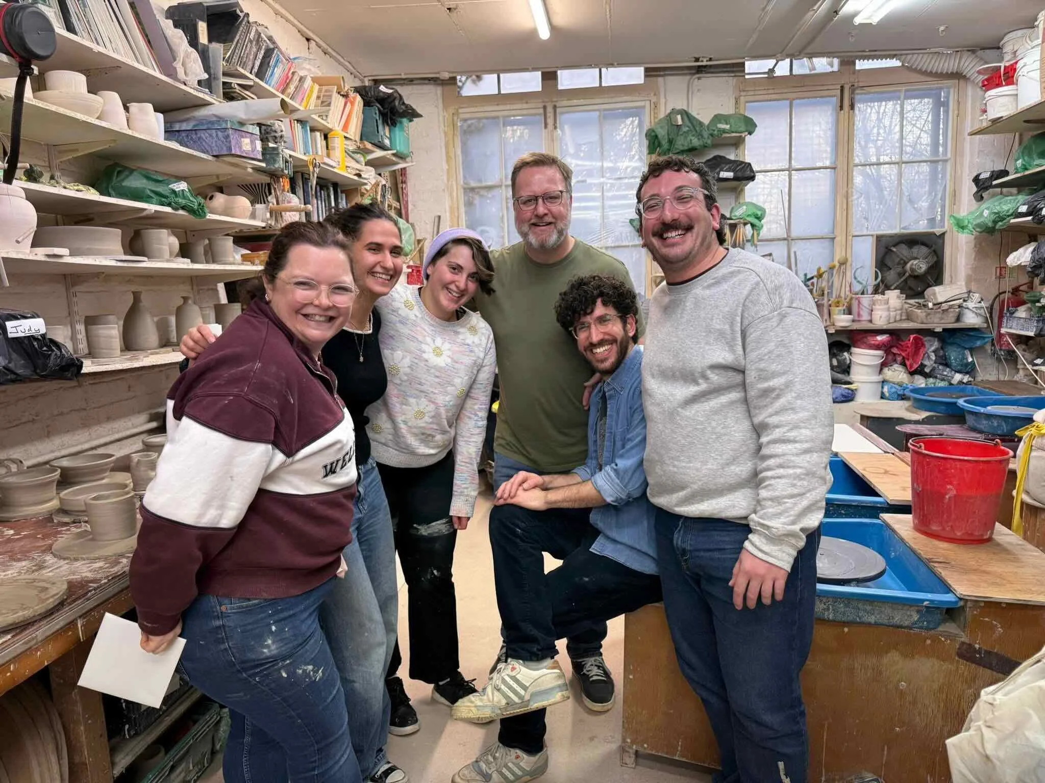Martin, standing with the Limmud office team at a pottery throwing afternoon.