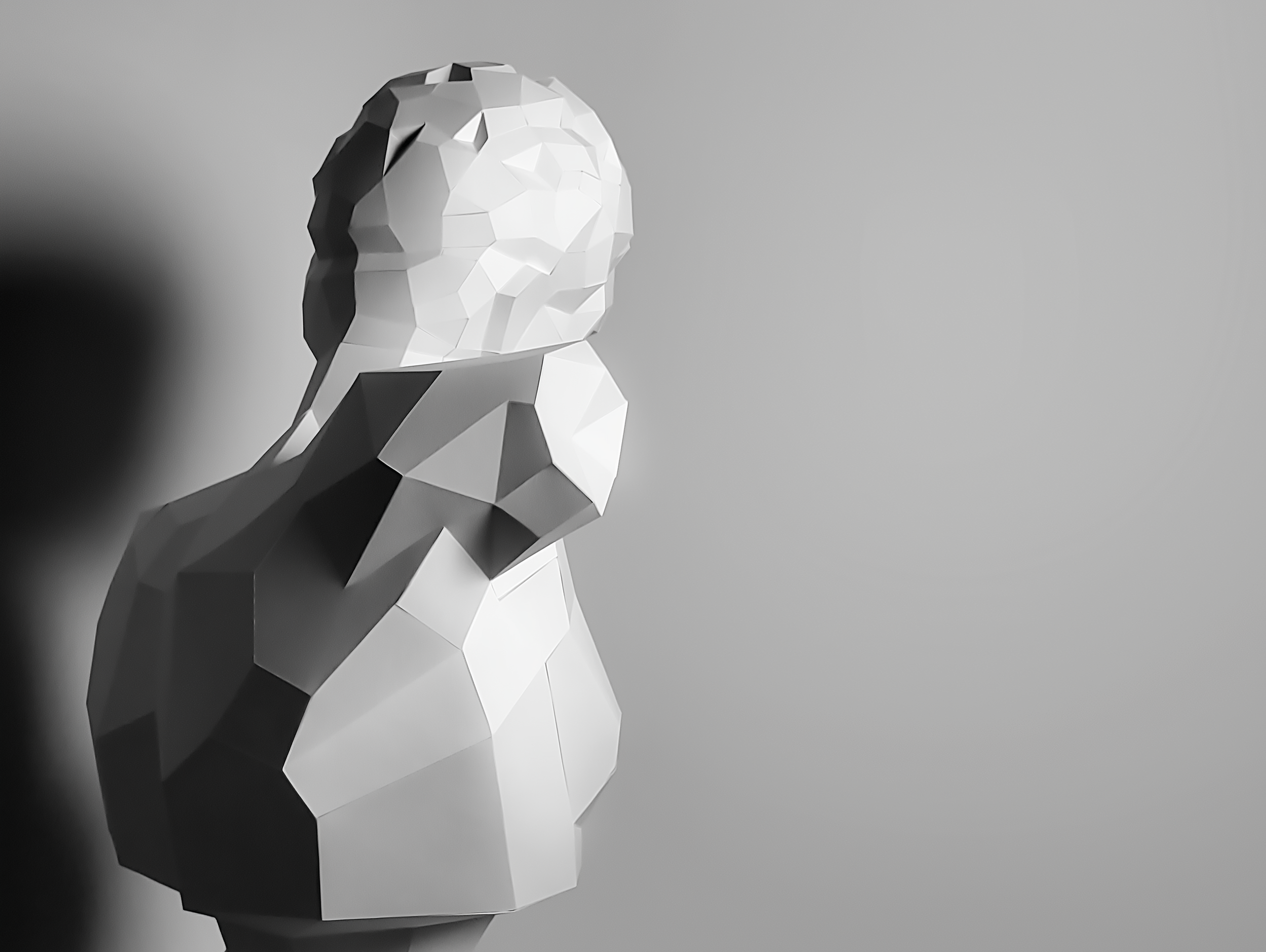 LUMISCA Hermes: A sharp low-poly paper sculpture highlighting the 'White Line' at the edge of darkness. 36 years of heritage in light and shadow.