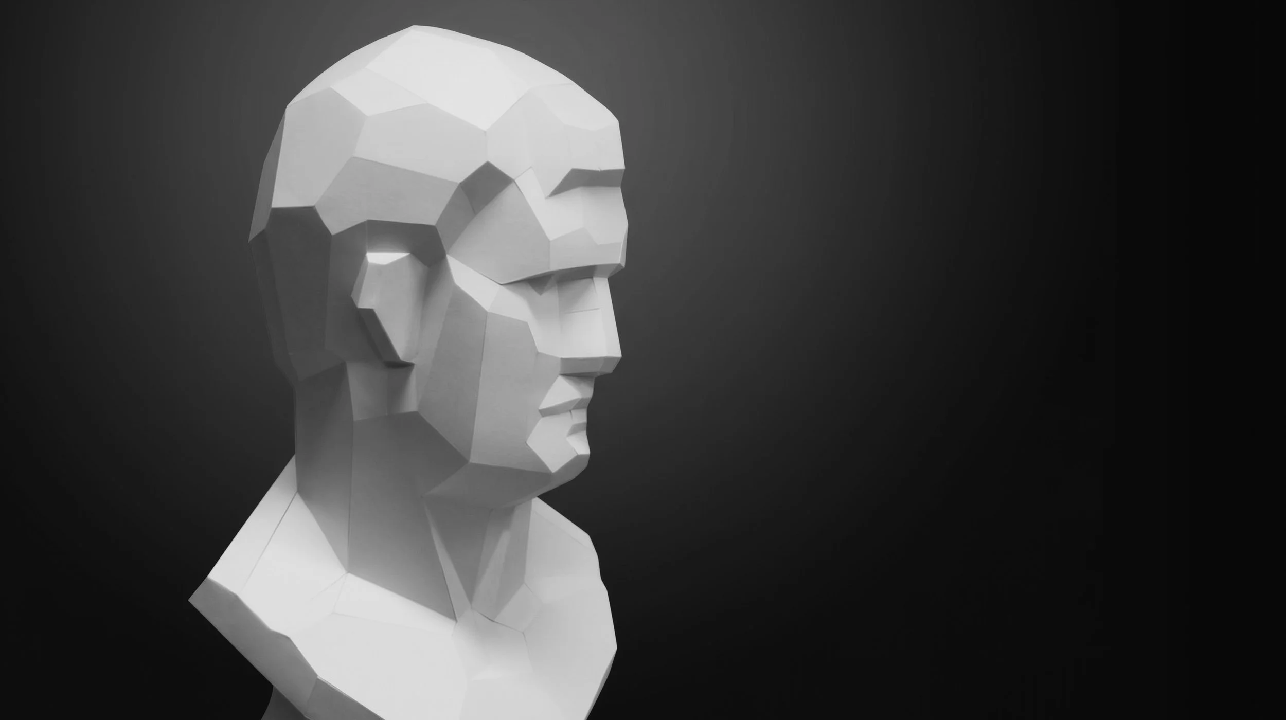 LUMISCA Agrippa low-poly paper sculpture. Minimalist interior object emphasizing the contrast between light and shadow.