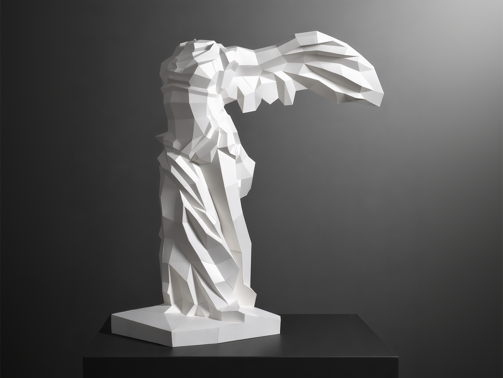 Full-view of LUMISCA's Nike of Samothrace paper sculpture. A masterpiece of 3D modeling and handcrafting, symbolizing resilience and triumph through light.