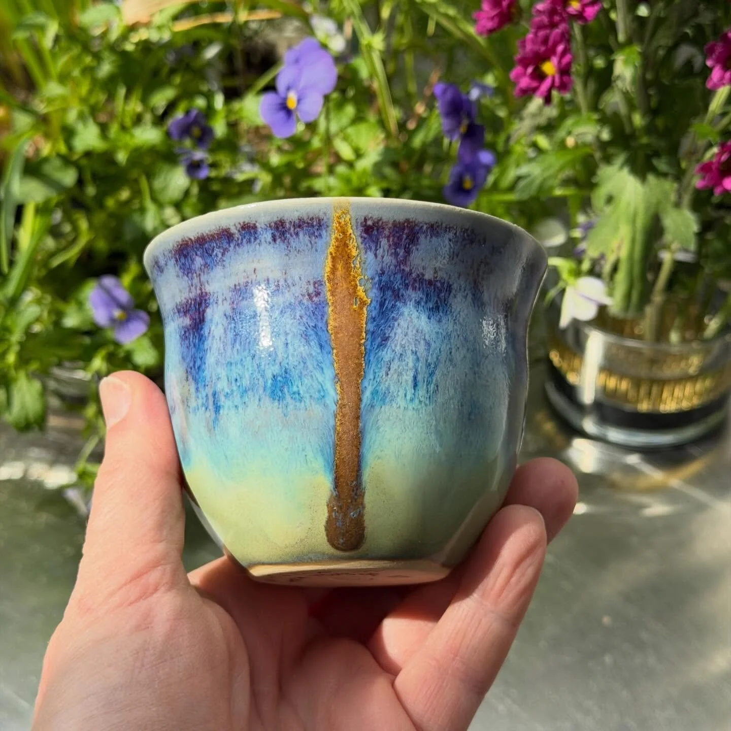 Small cup on White Clay body with new glaze experiment