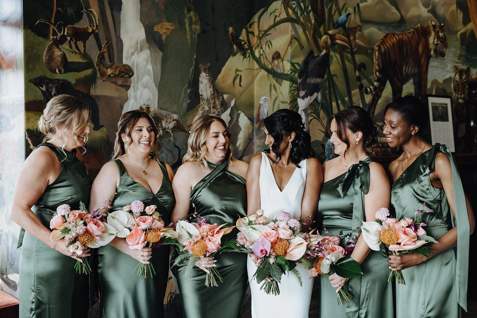 Kent bridal party holding luxury floral bouquets