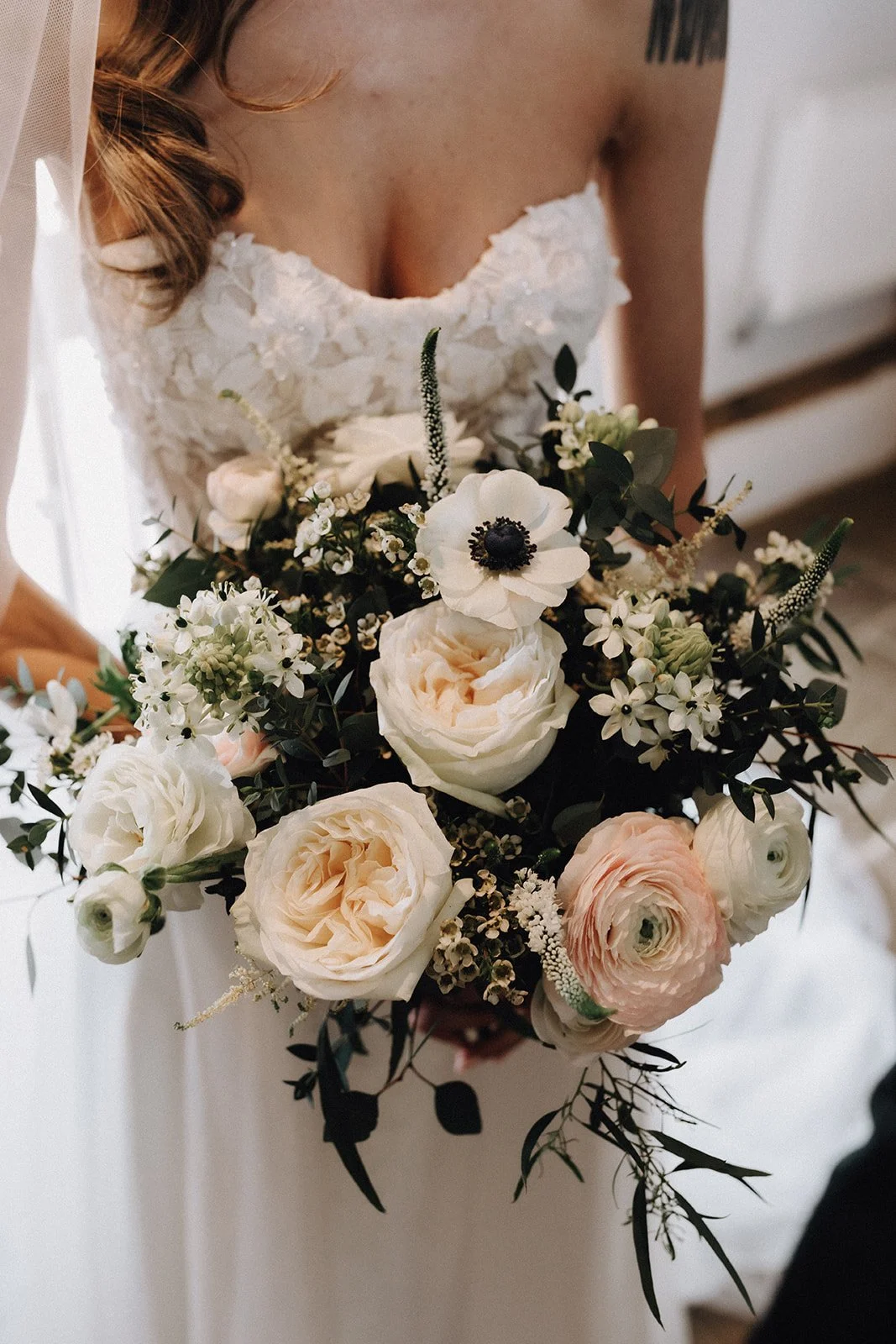 moody-blooms-luxury-wedding-bouquet-white-blush-anemones-lace-dress.jpg