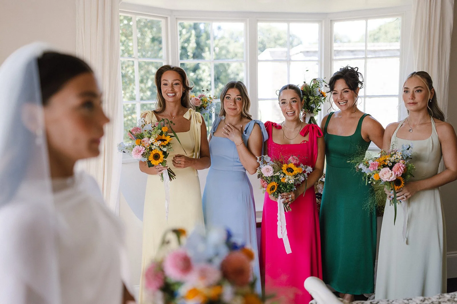 moody-blooms-bridesmaid-wedding-bouquets-sunflowers-colourful-flowers.jpg