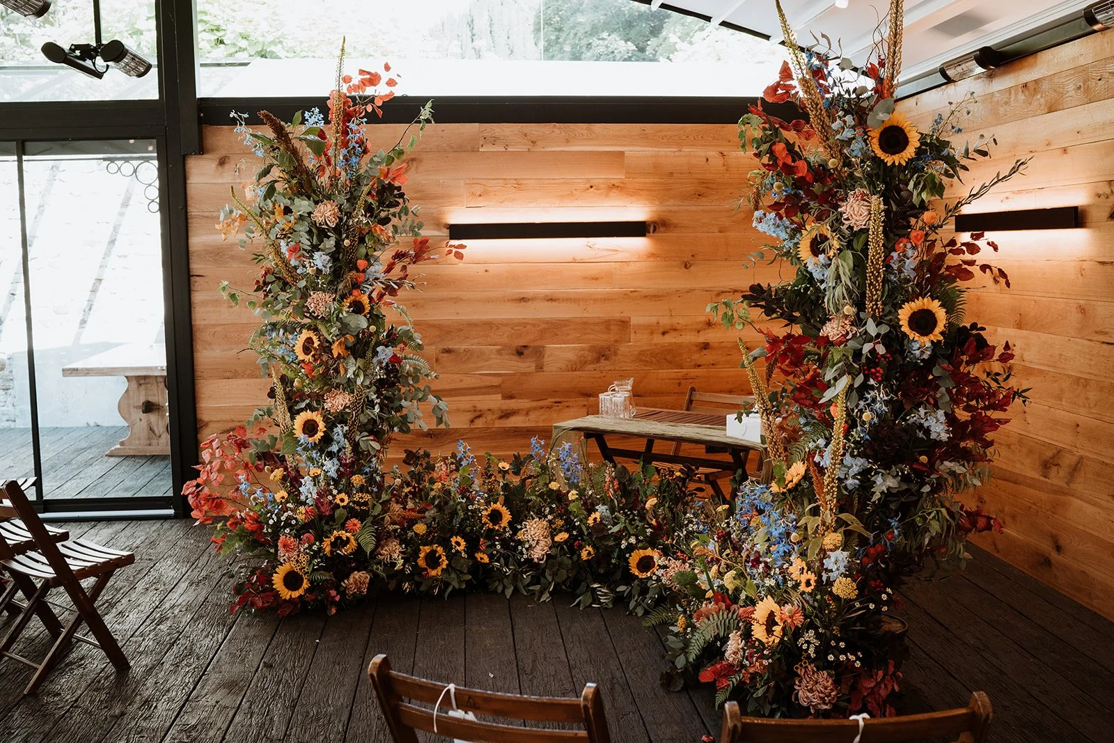 Luxury flower installation with sunflowers at London wedding