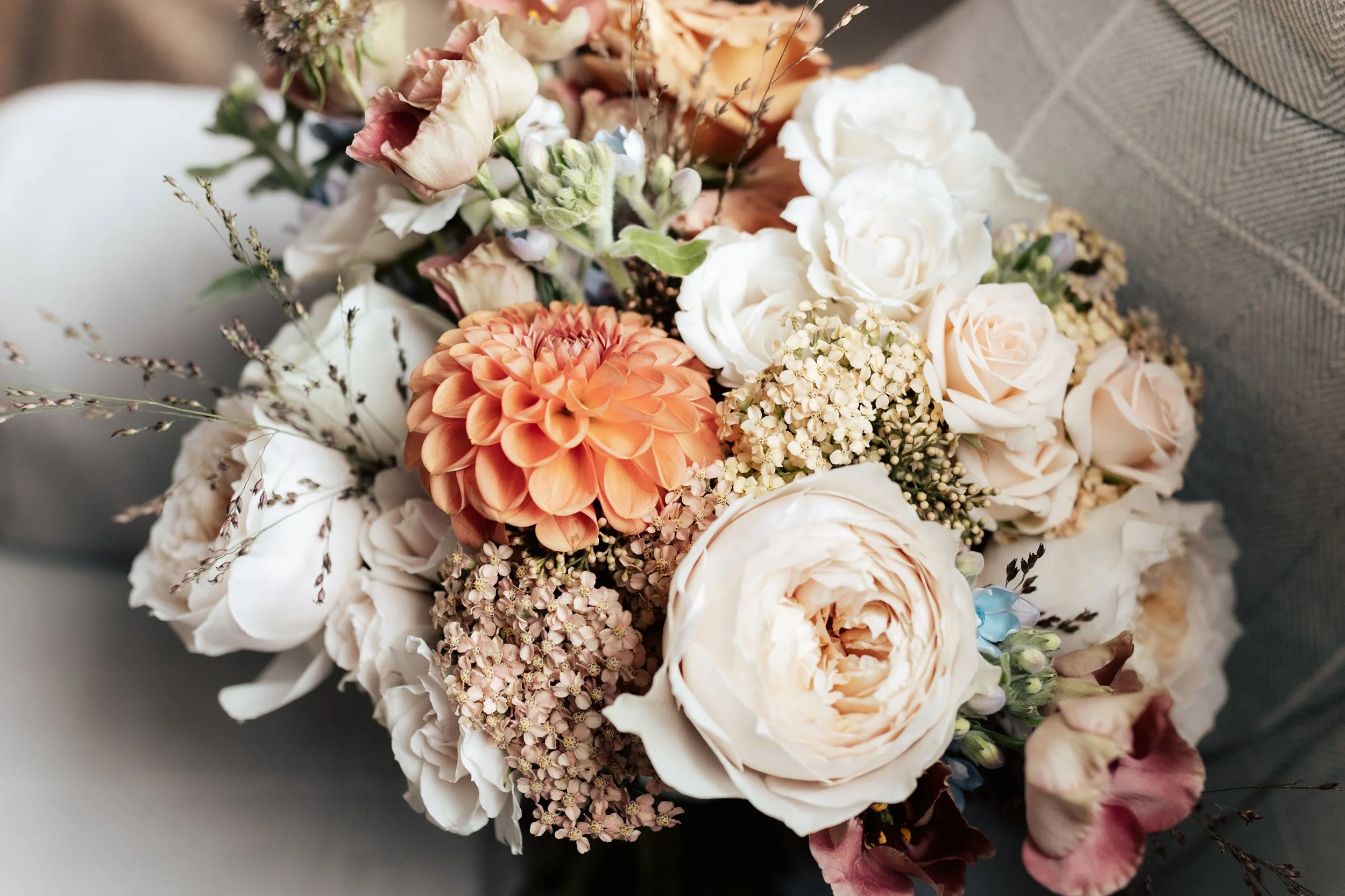 Luxury wedding bridal bouquet peach dahlia garden roses