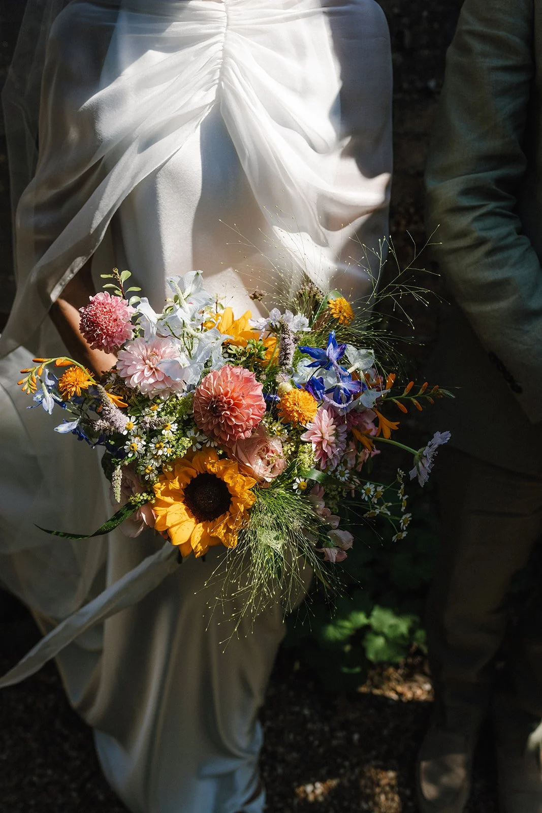 moody-blooms-wedding-bouquet-sunflower-wildflowers-bride.jpg