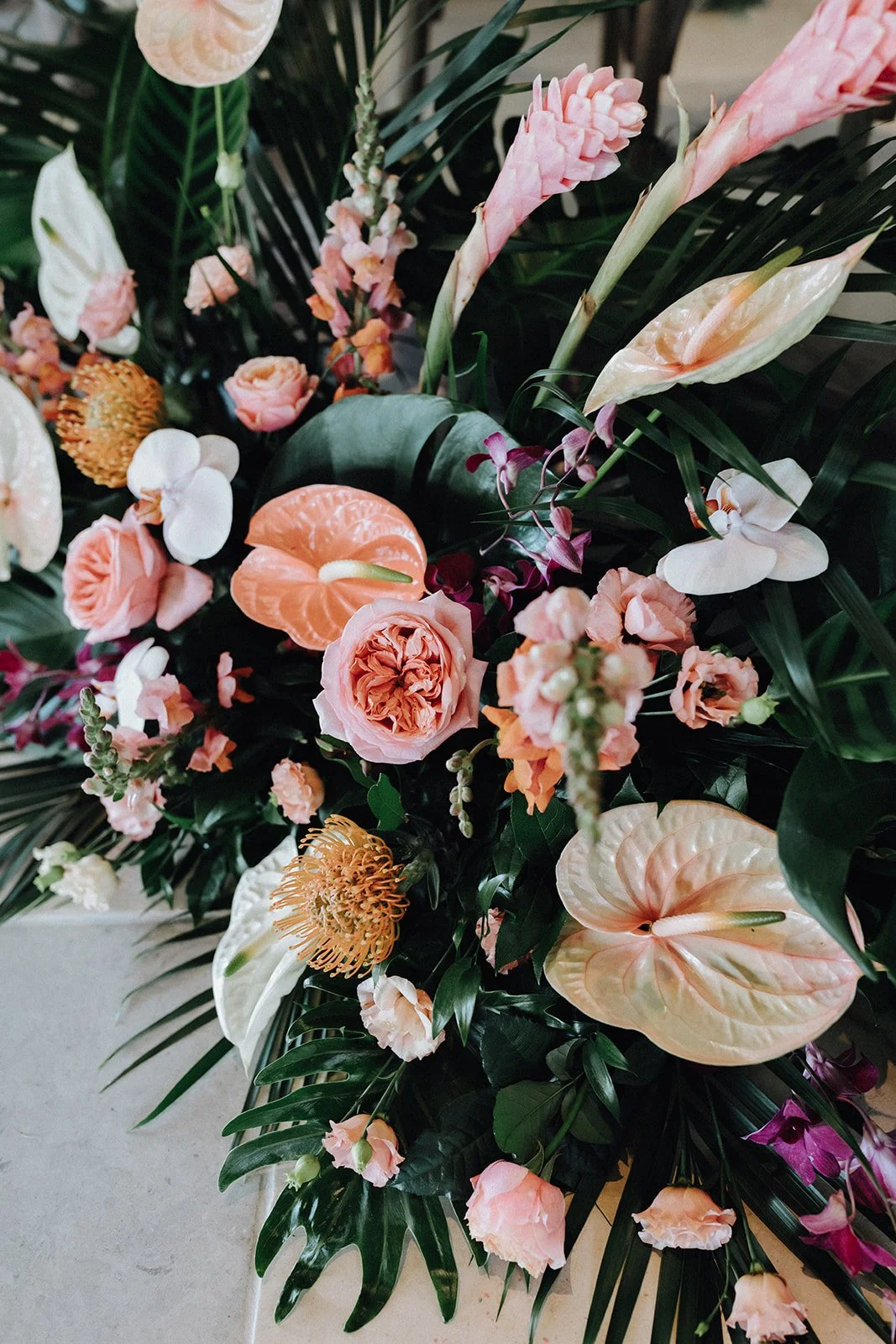 moody-blooms-luxury-tropical-wedding-flowers-anthurium-orchids-arrangement.jpg