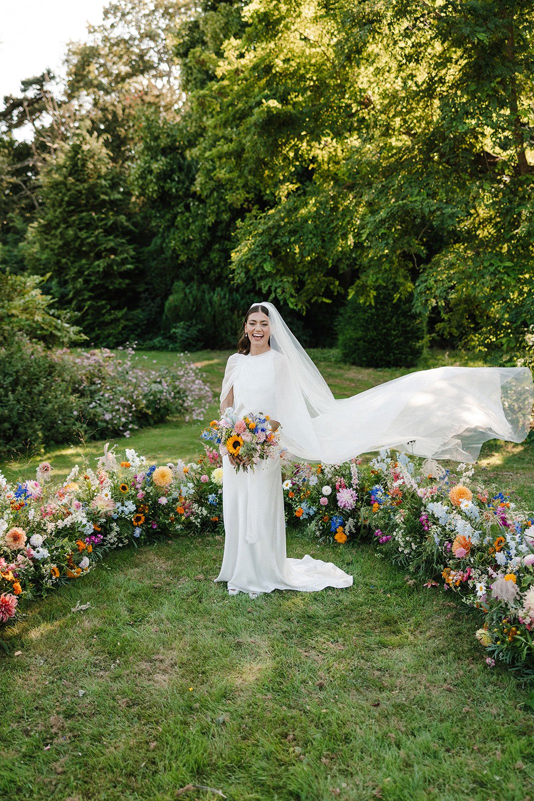moody-blooms-bride-wildflower-ceremony-aisle-colourful-wedding-kent.jpg