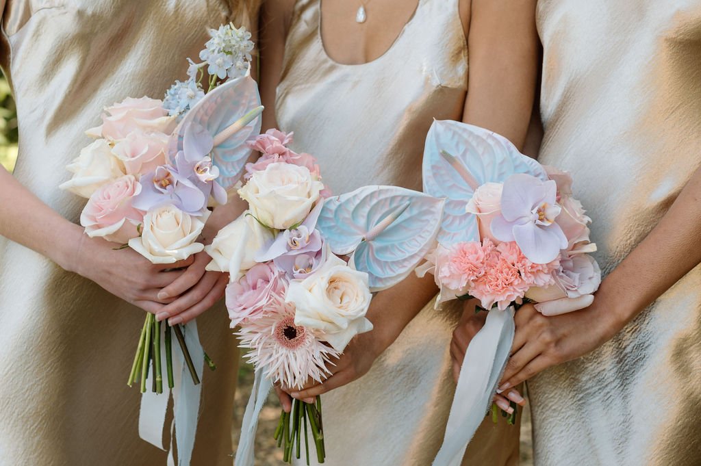 moody-blooms-wedding-bouquet-pastel-anthurium-bridesmaids.jpg