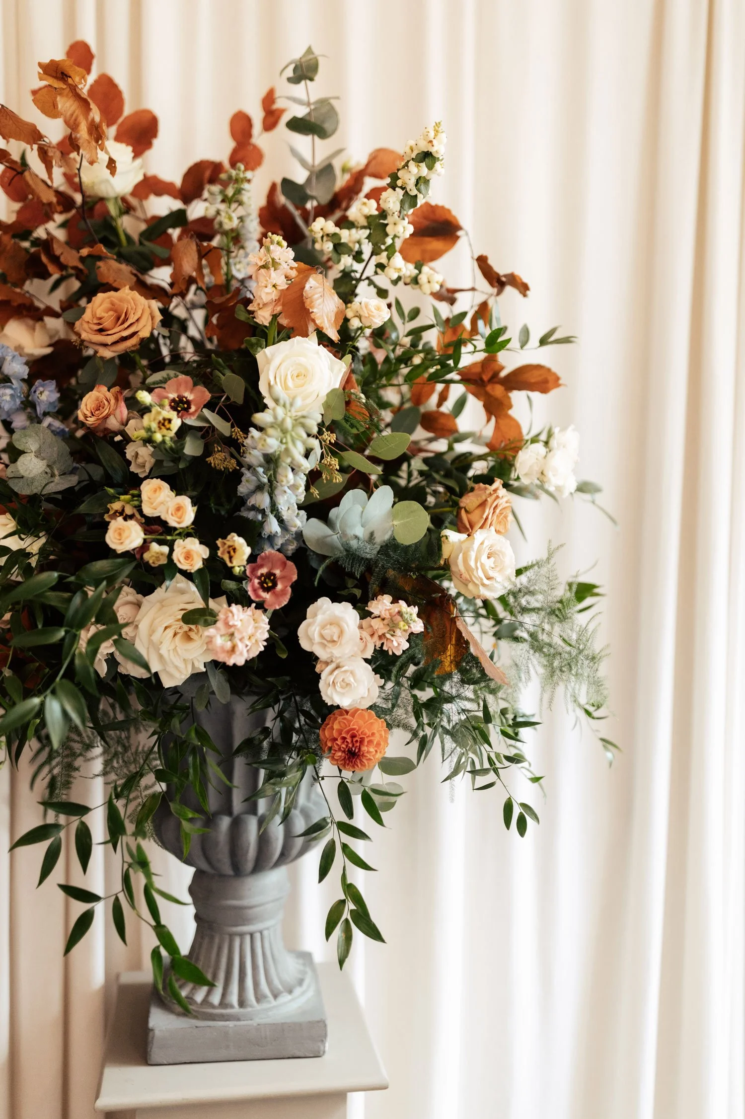 moody-blooms-luxury-autumn-wedding-floral-urn-arrangement-roses-kent.jpg