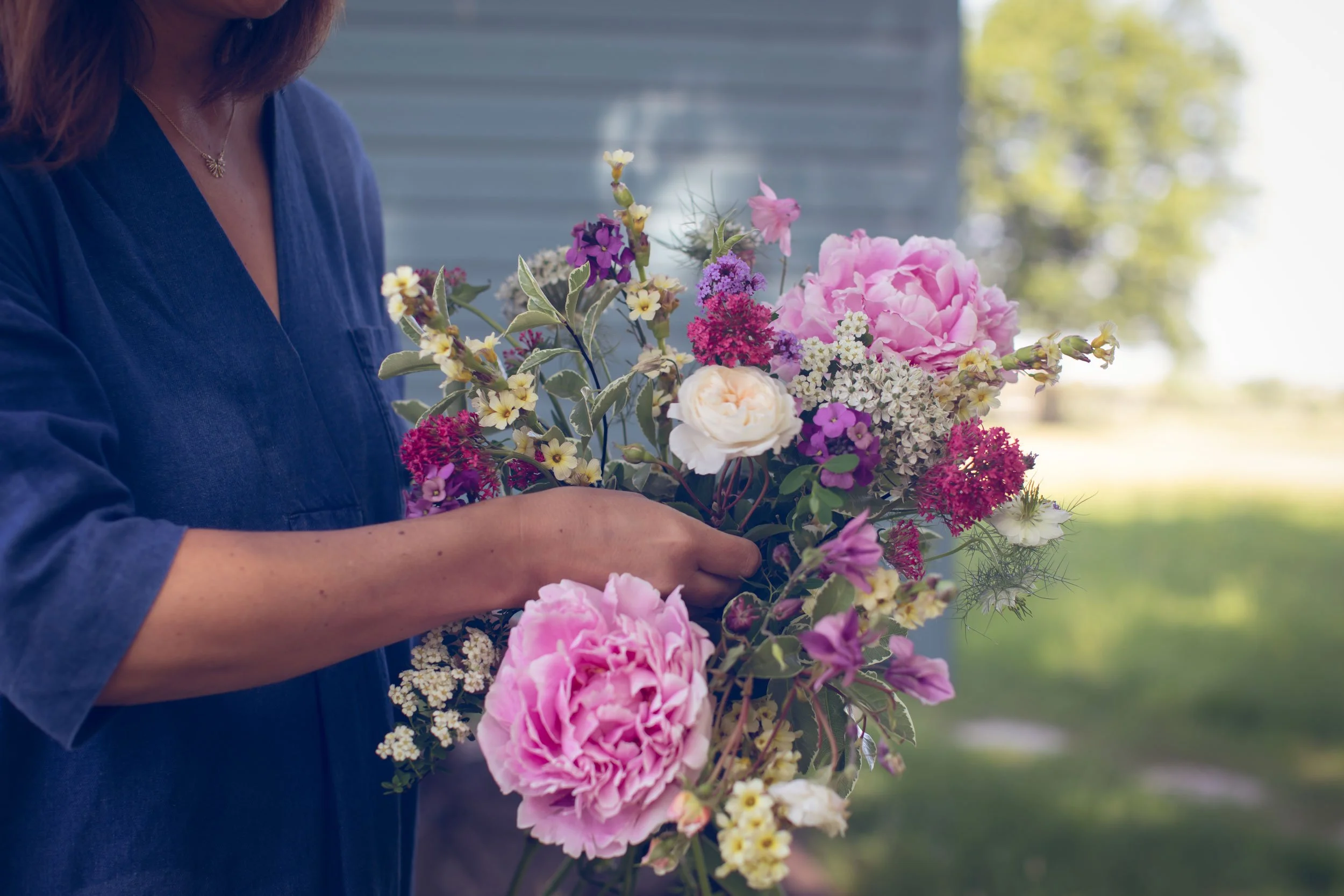 Close up of pink floral bouquet in garden