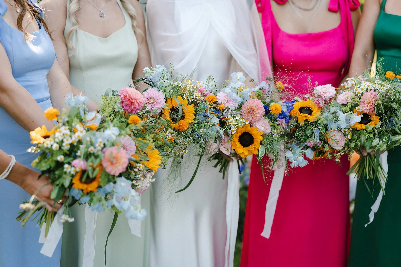 moody-blooms-wedding-florist-kent-bridal-party-sunflower-bouquets.jpg