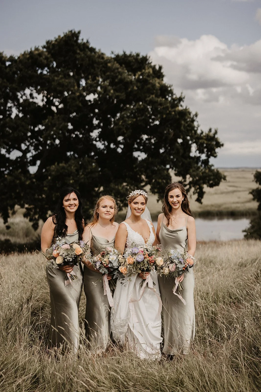 moody-blooms-bride-bridesmaids-wildflower-bouquets-meadow-kent-wedding.jpg