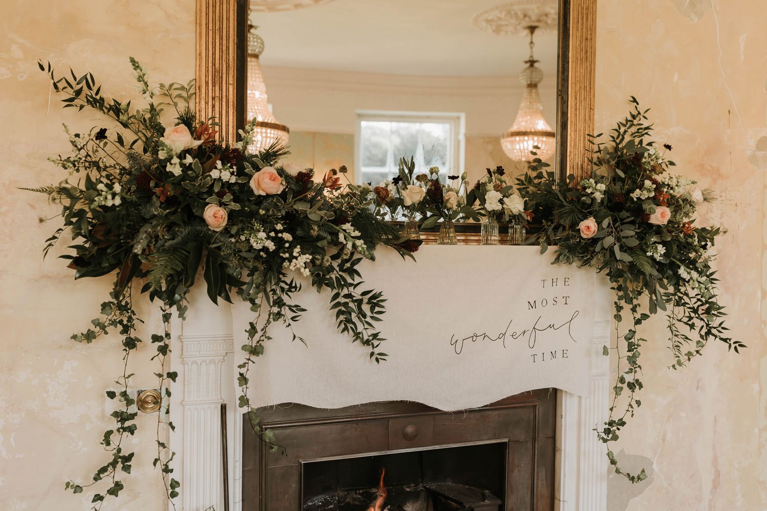 moody-blooms-christmas-winter-wedding-flowers-fireplace-mantle-kent.jpg