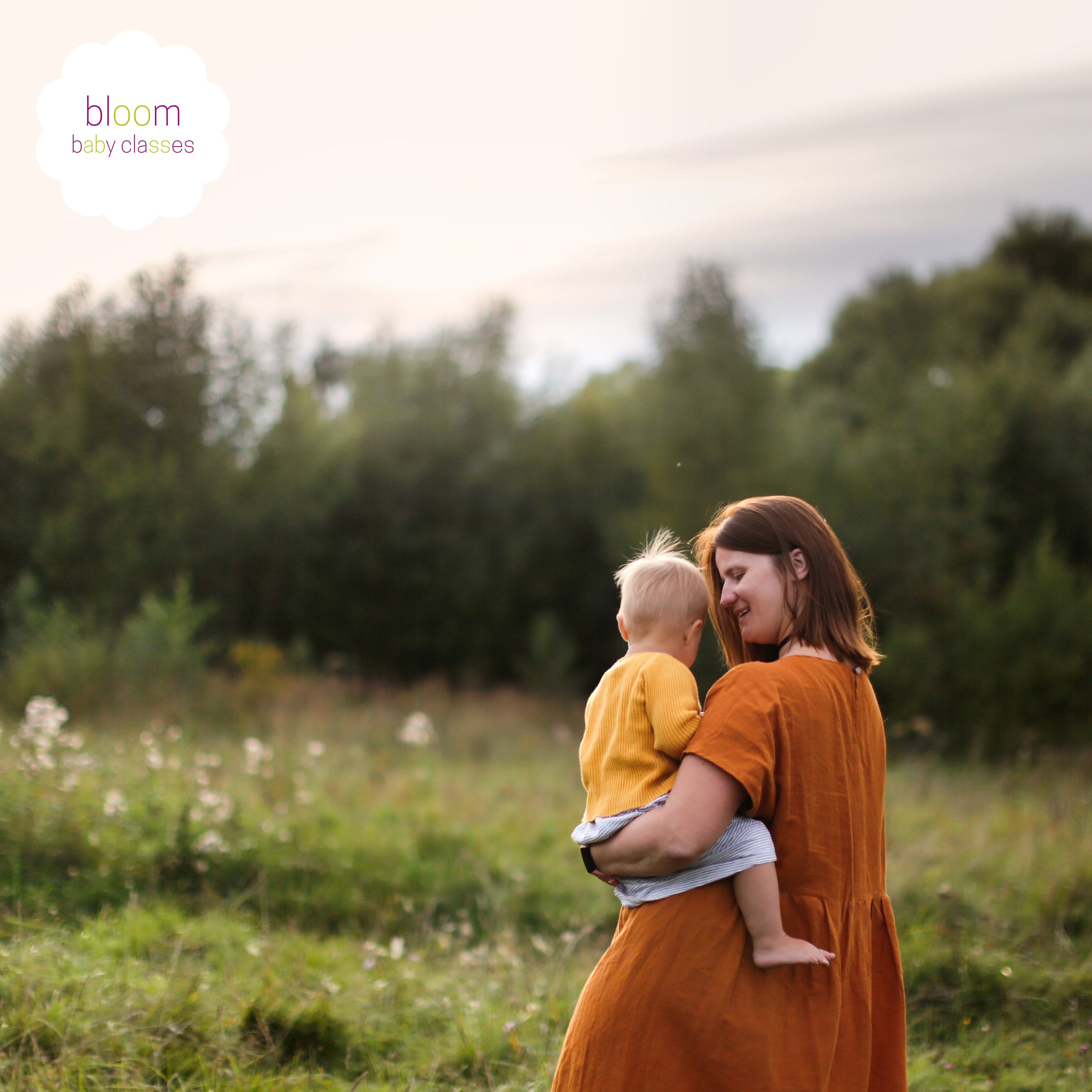 Mother connecting with baby in nature