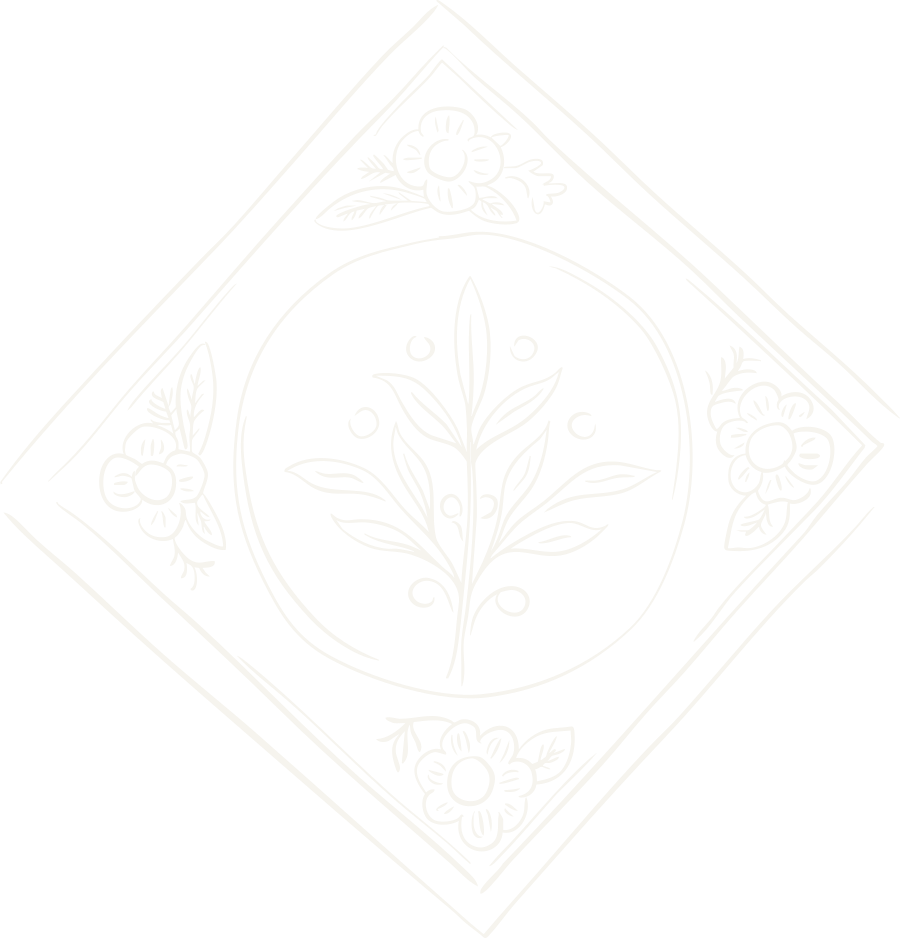 White floral design with leaves and flowers on a black background, arranged in a diamond shape.