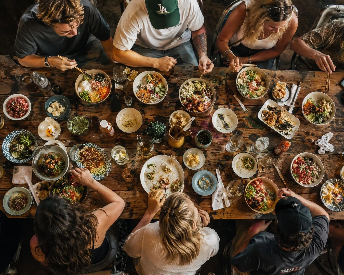 friends enjoying Soul Bowl meal kit with fresh poke bowl ingredients ready to assemble at home