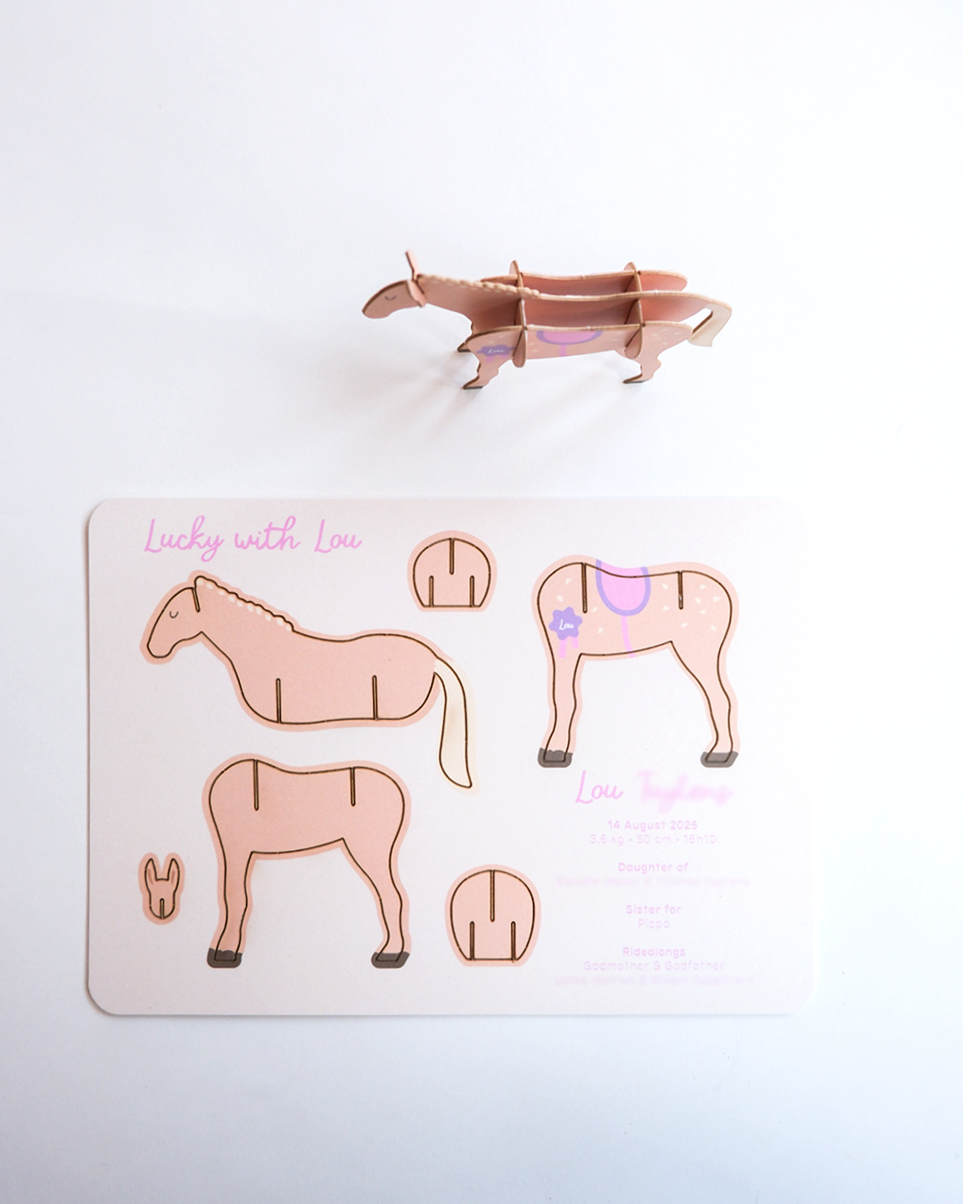 Interactive birth announcement with laser cut horse pieces for baby