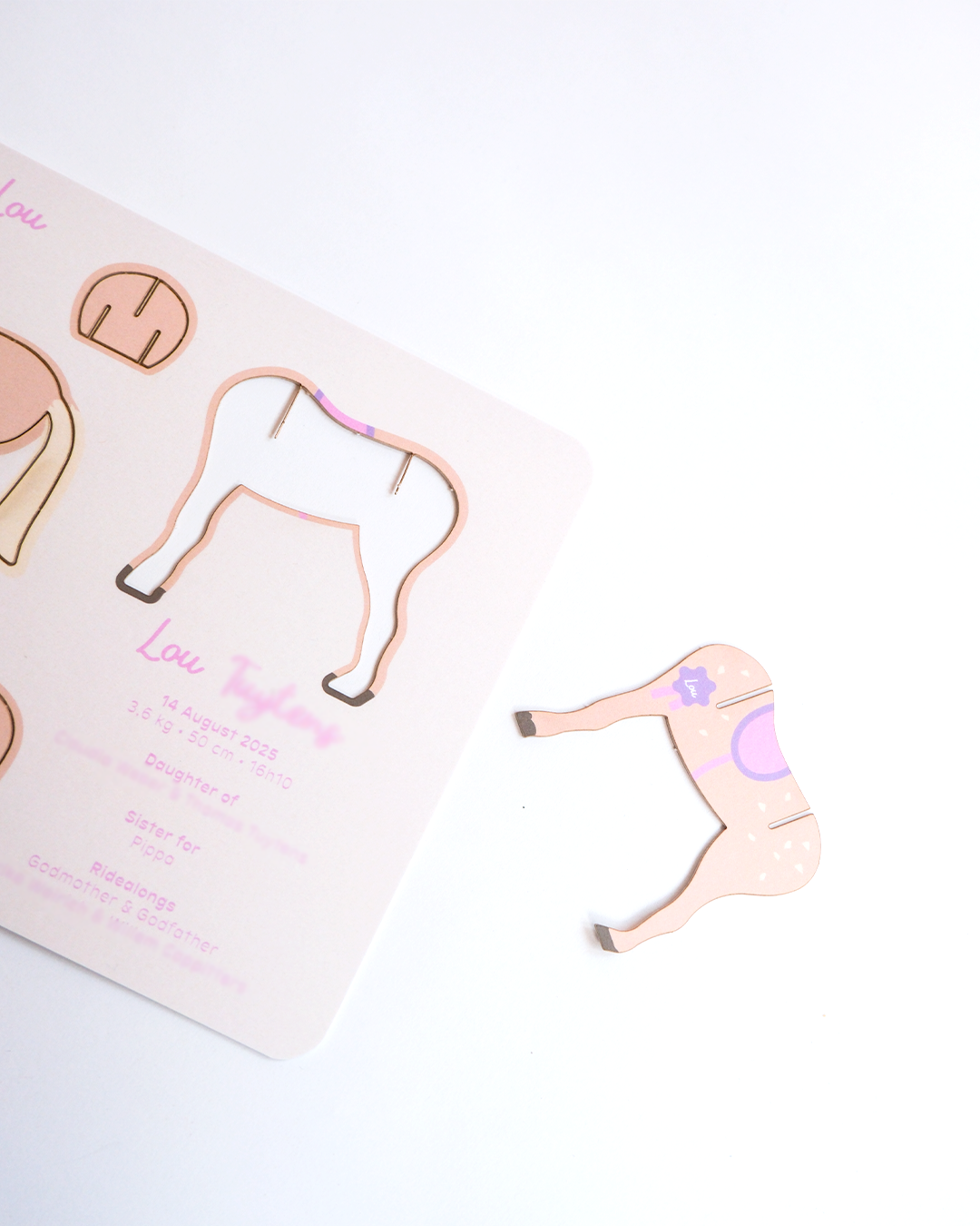 Interactive birth announcement with laser cut horse pieces for baby