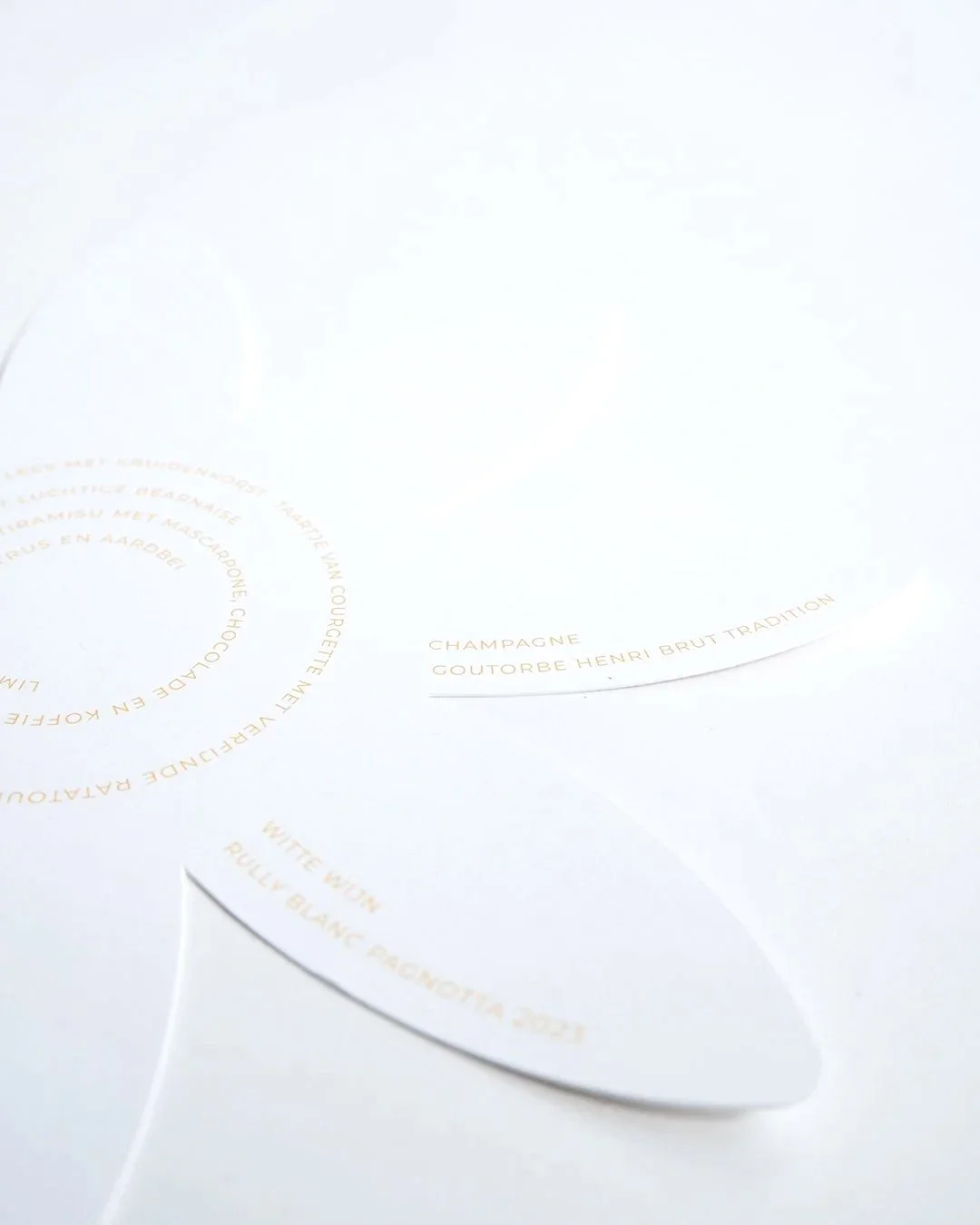 Letterpress wedding invitation with blind embossed flower detail