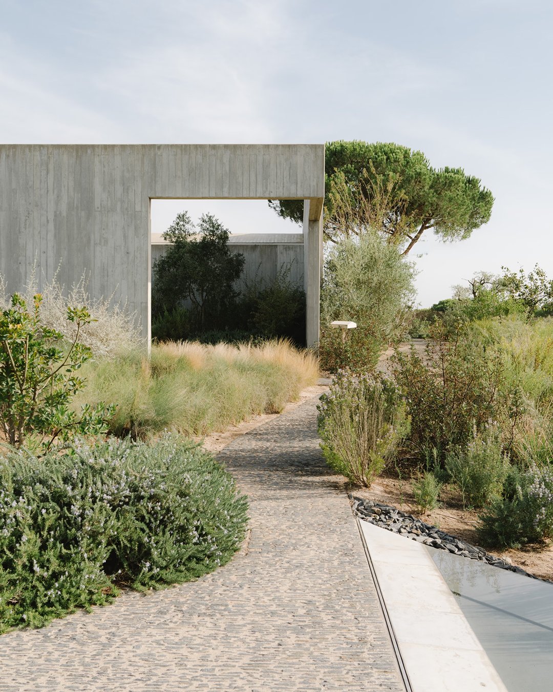 Architectural wedding stationery suite with folded elements and minimalist design.