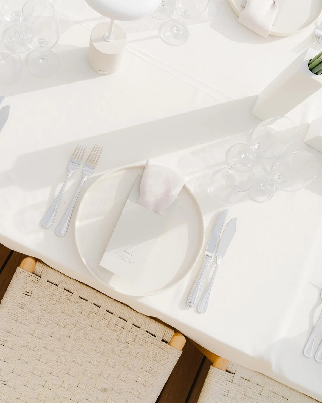 Architectural wedding stationery suite with folded elements and minimalist design.