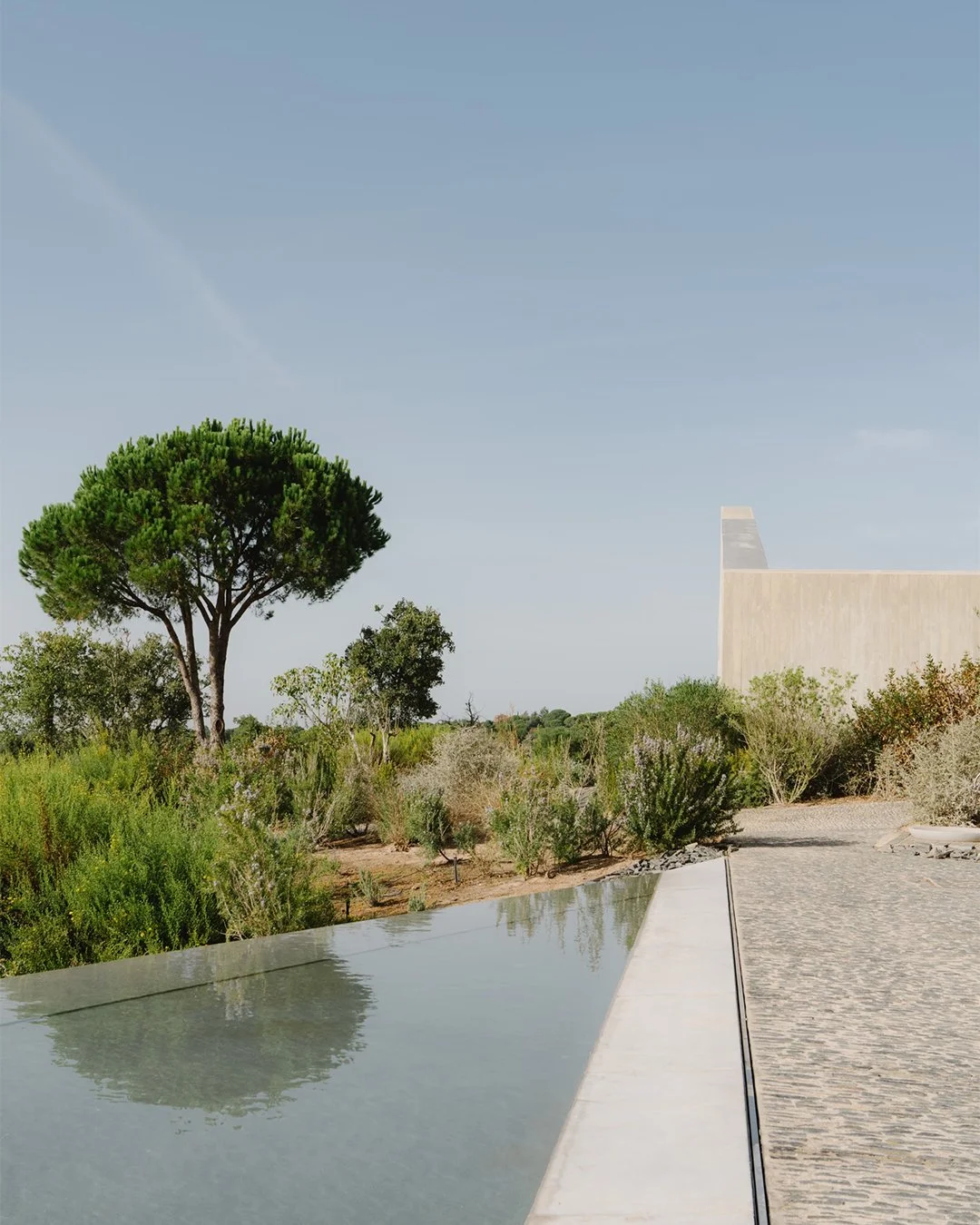 Architectural wedding stationery suite with folded elements and minimalist design.