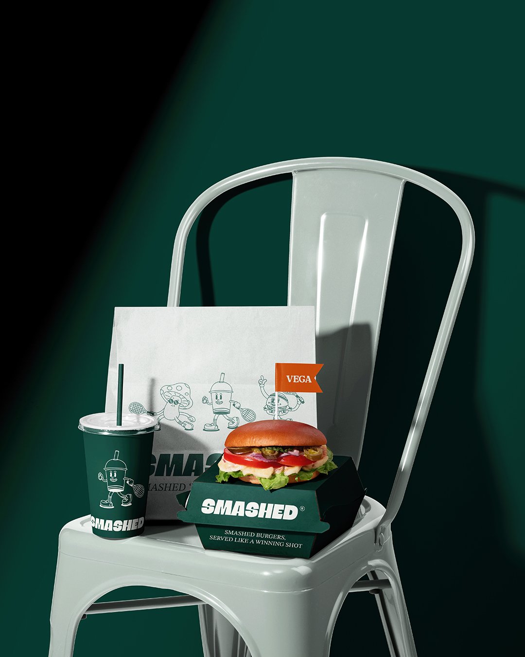 Brand identity concept for SMASHED burger restaurant with tennis-inspired theme and playful sports branding.