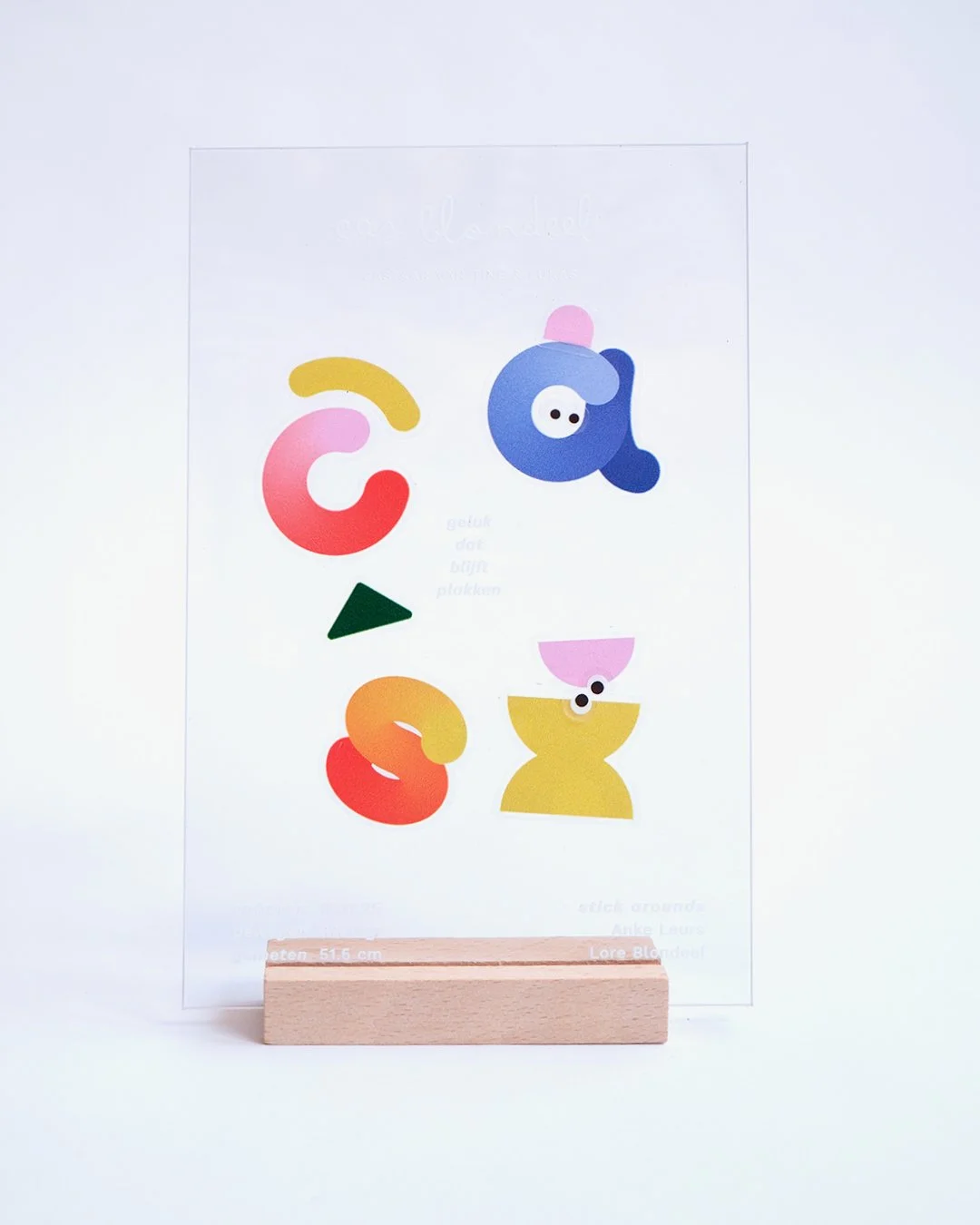 Transparent plexi birth announcement for Cas with reusable stickers allowing recipients to create playful compositions