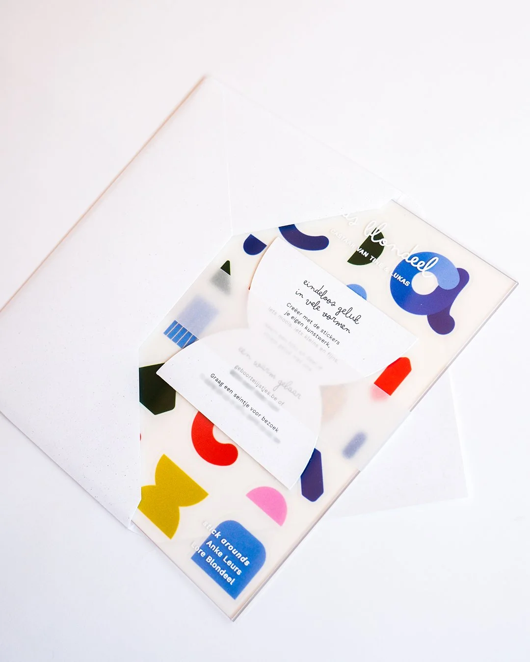 Transparent plexi birth announcement for Cas with reusable stickers allowing recipients to create playful compositions