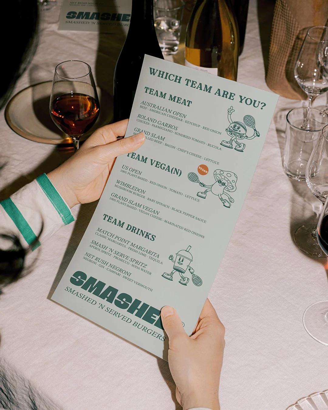 Brand identity concept for SMASHED burger restaurant with tennis-inspired theme and playful sports branding.