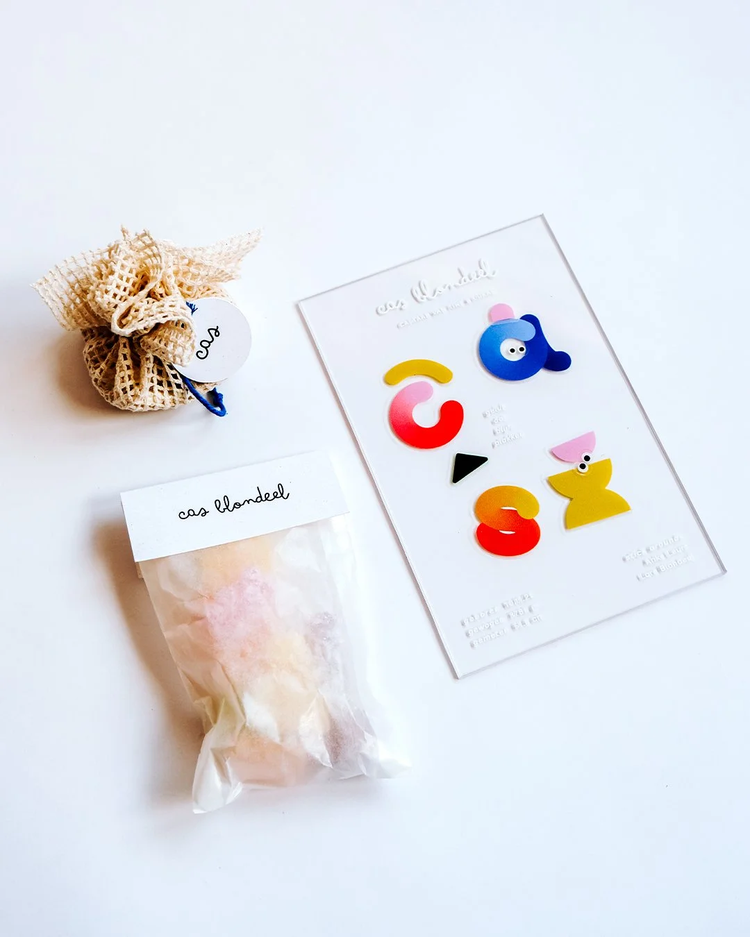 Transparent plexi birth announcement for Cas with reusable stickers allowing recipients to create playful compositions