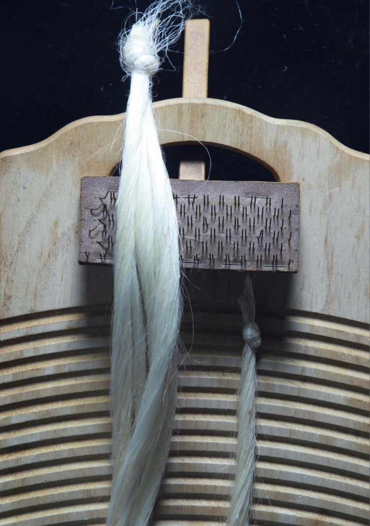 Showcasing a special variety of Muka fibre known for its softness and natural white hue.