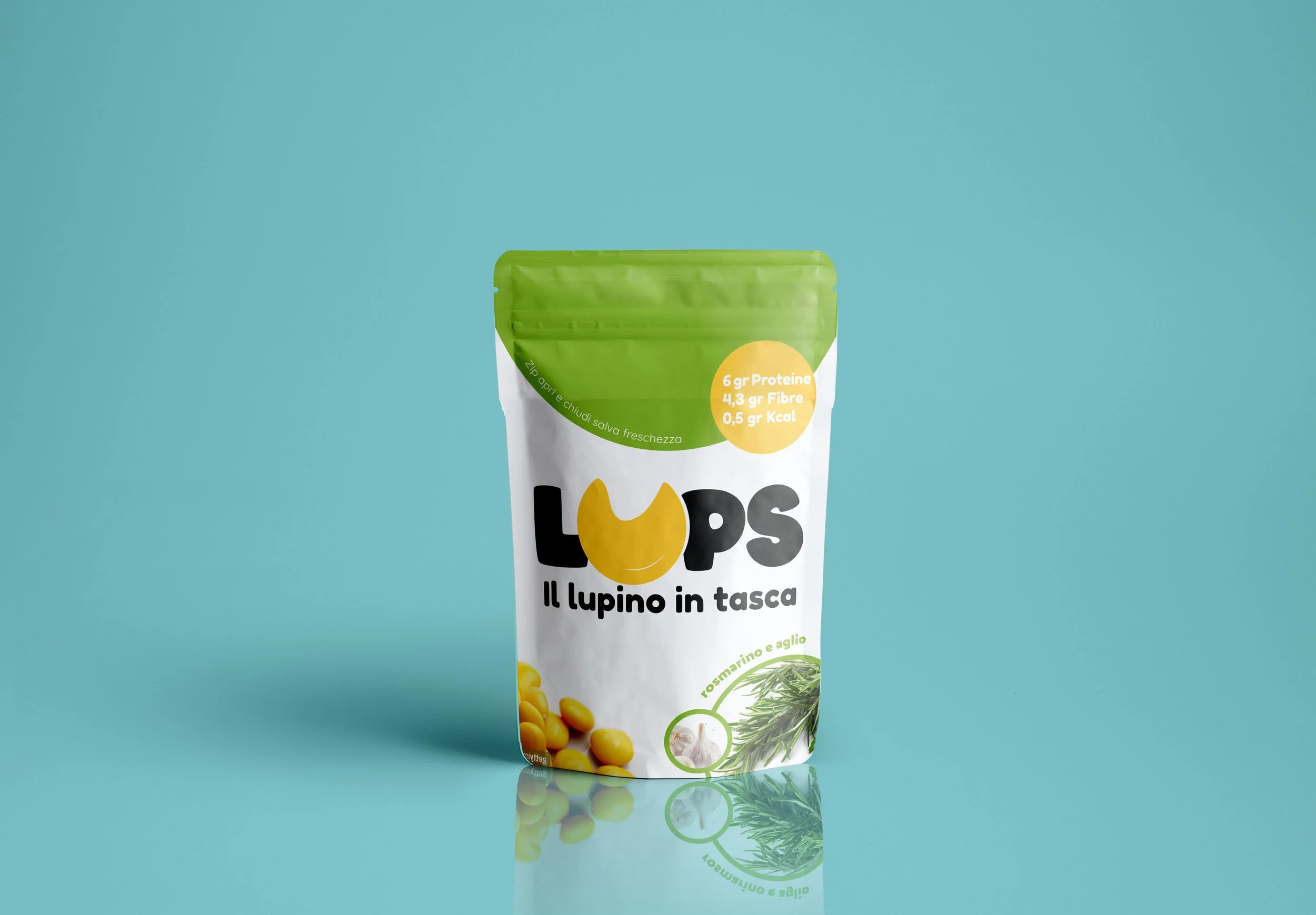 Packaged food product with a green top, labeled with nutritional information and ingredients, including chickpeas, garlic, rosemary, and other herbs, set against a light blue background.