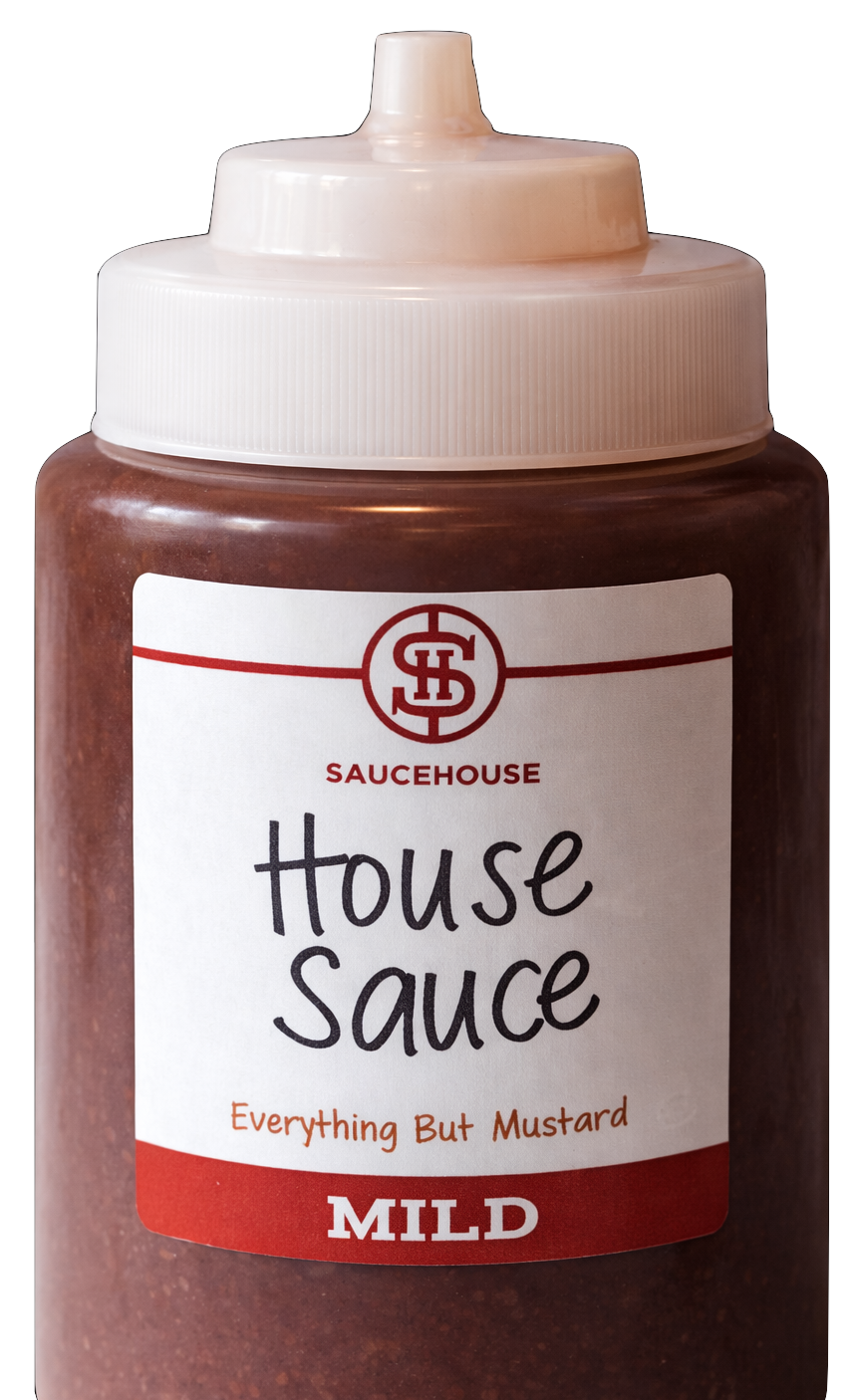 Bottle of house sauce with white cap, red label, and pointing to mild flavor, labeled 'Saucehouse House Sauce Everything But Mustard Mild'.