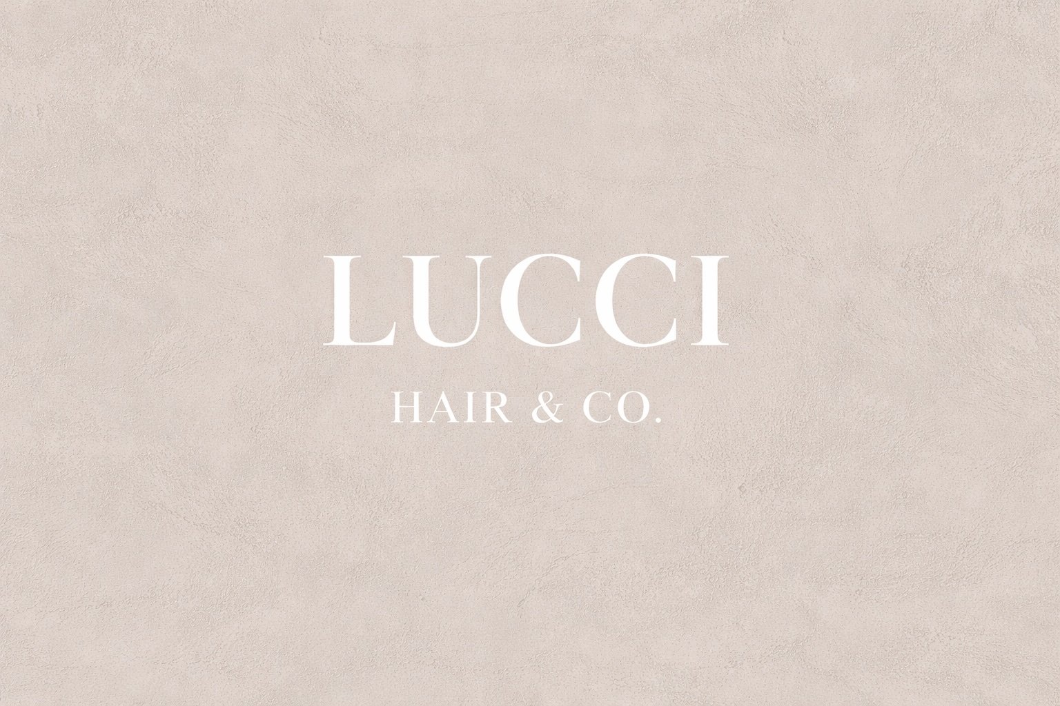 Lucci Hair & Co. logo on beige background.