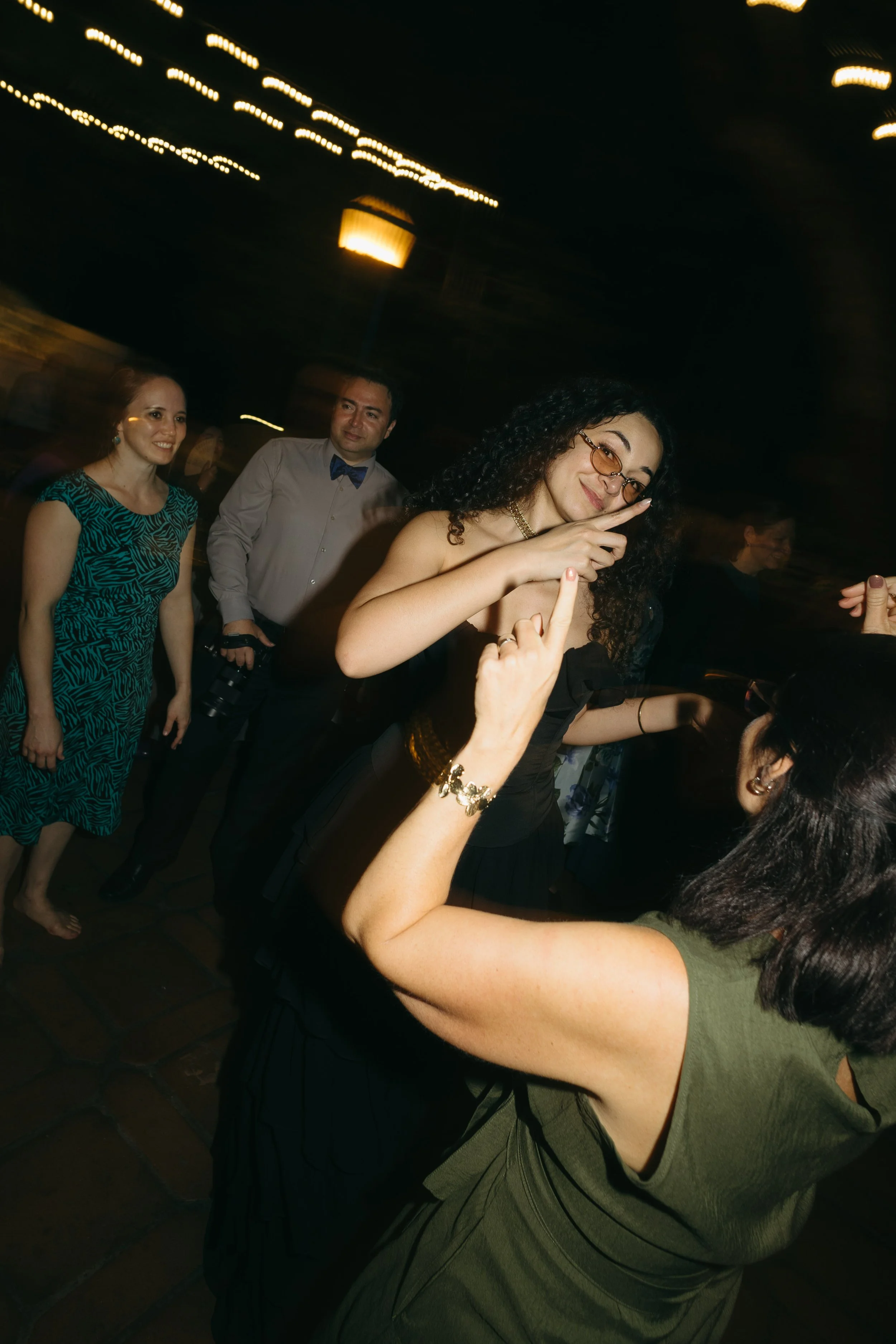 People dancing and having fun at a party or celebration.