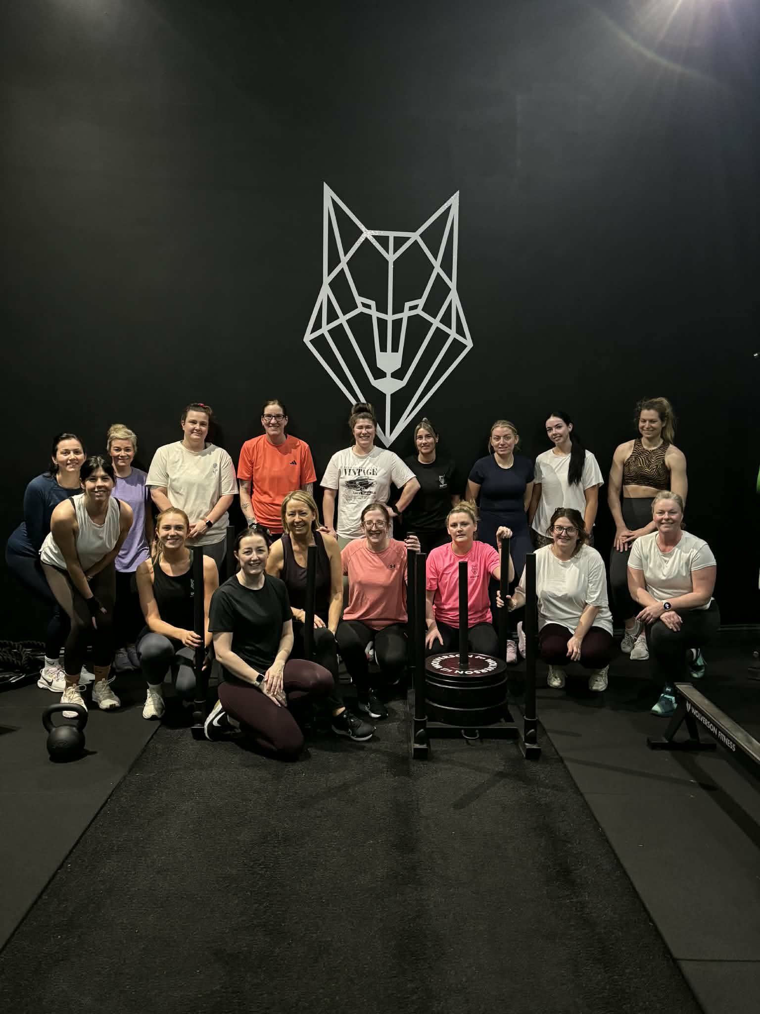 A group of women at Dottir Strength & Fitness after finishing a class.