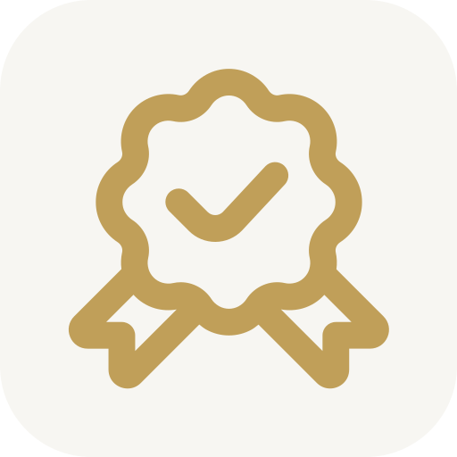 Icon of a gold checkmark badge with ribbons on a white background.